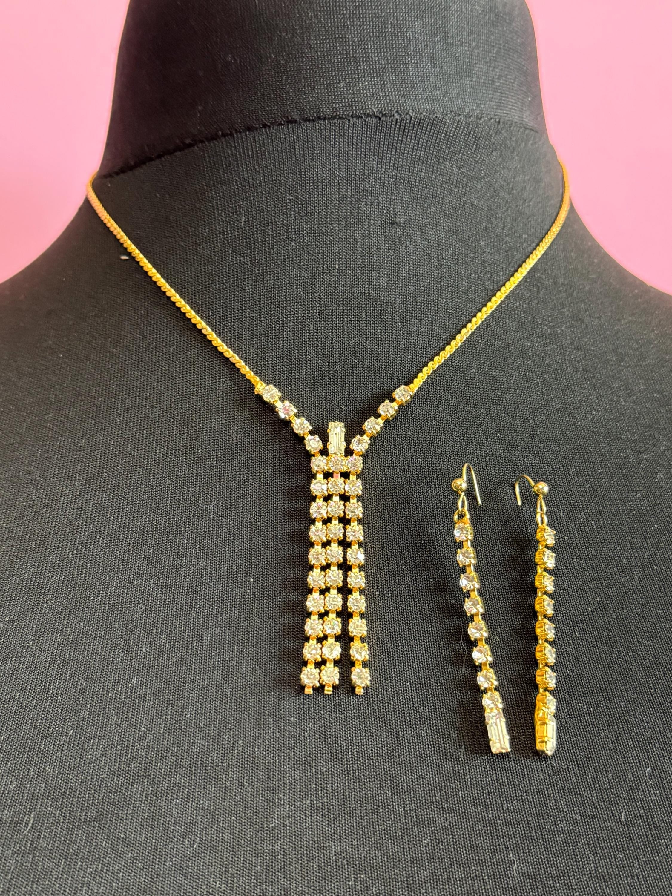 Retro gold tone jewellery set. Necklace long drop pierced dangly earrings clear glass diamanté gold tone metal Demi parure