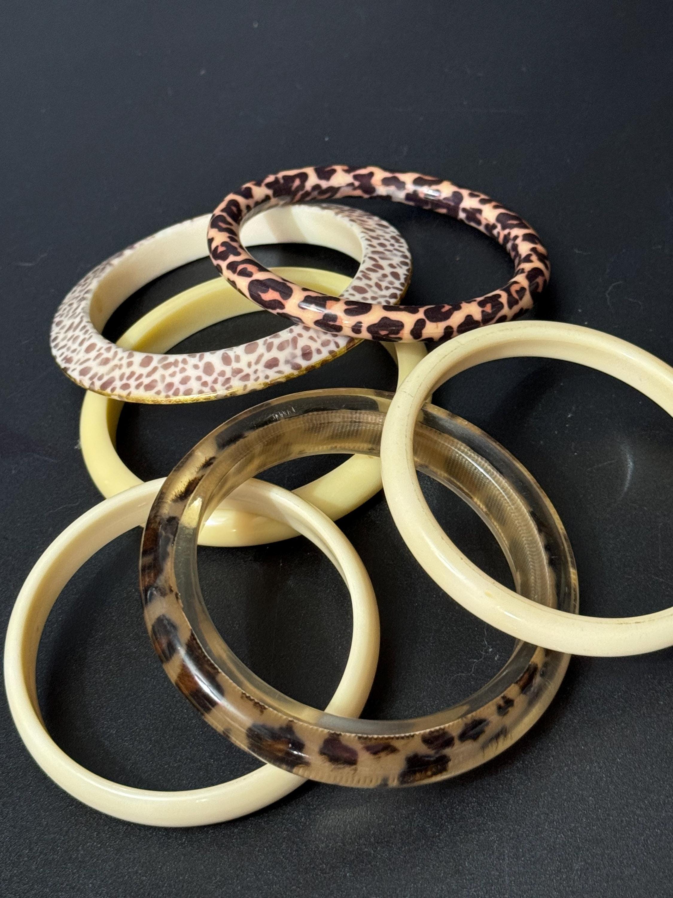 Cream brown yellow animal print beige stack of vintage retro plastic bangles