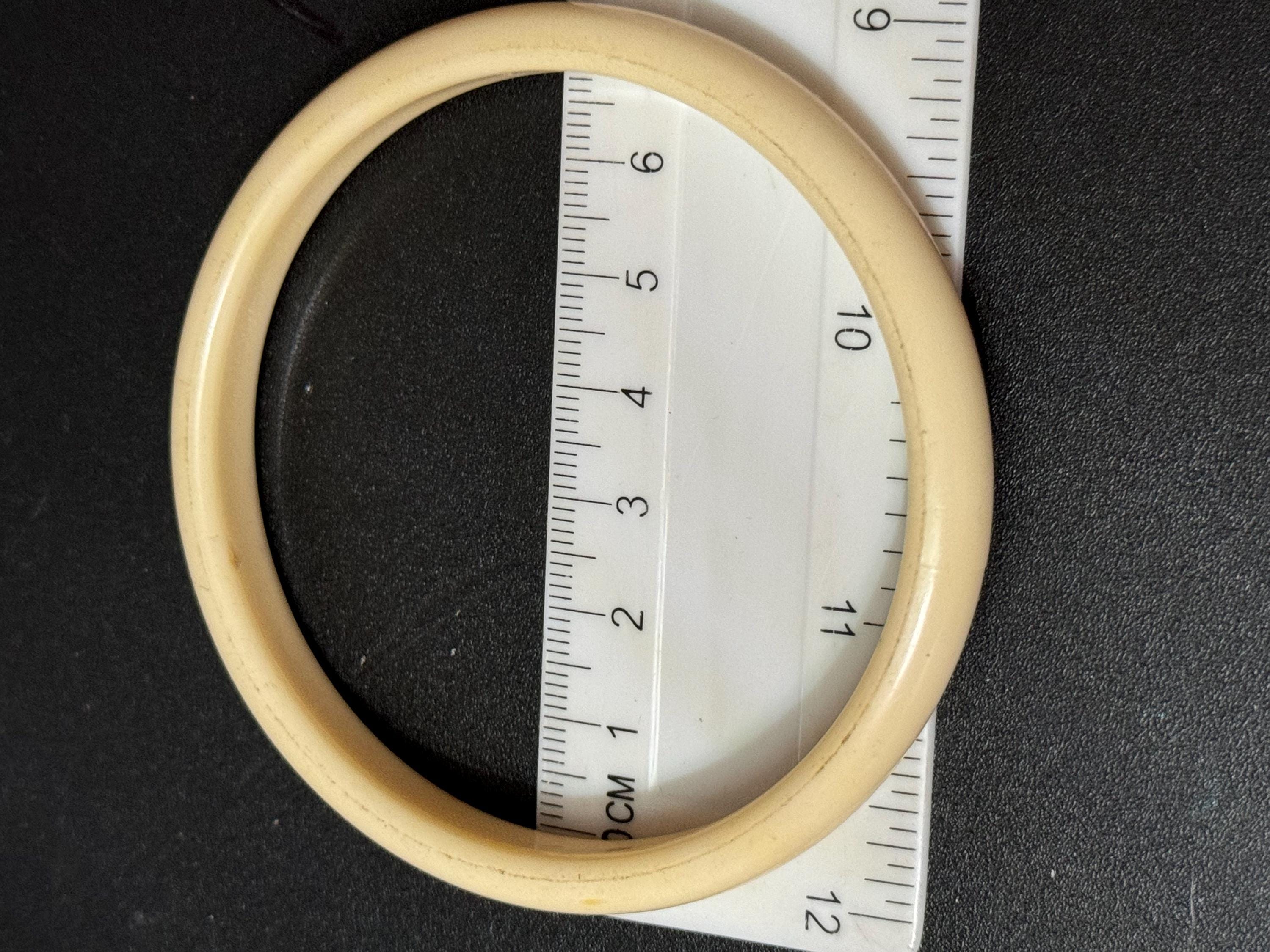 Cream brown yellow animal print beige stack of vintage retro plastic bangles