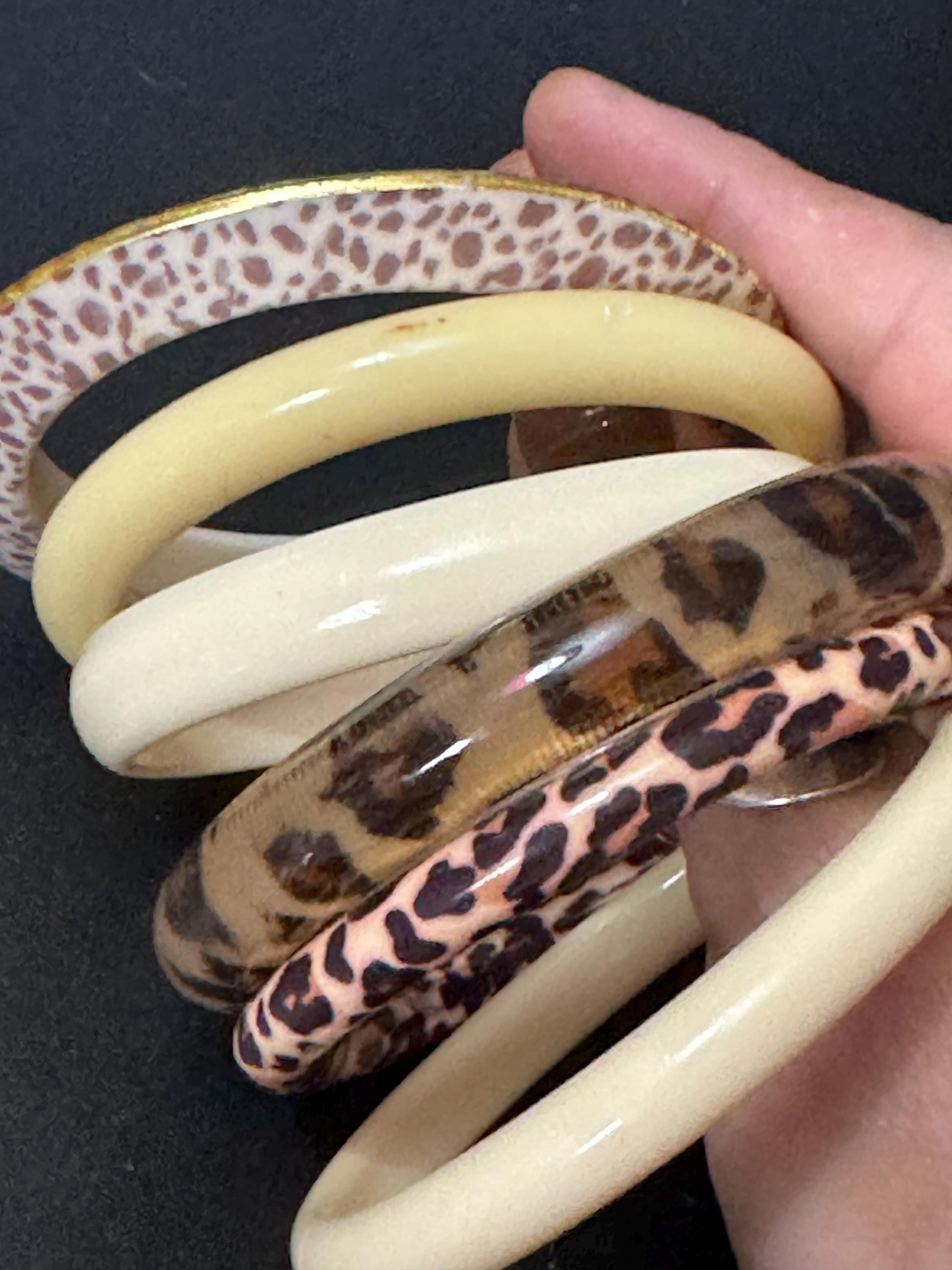 Cream brown yellow animal print beige stack of vintage retro plastic bangles