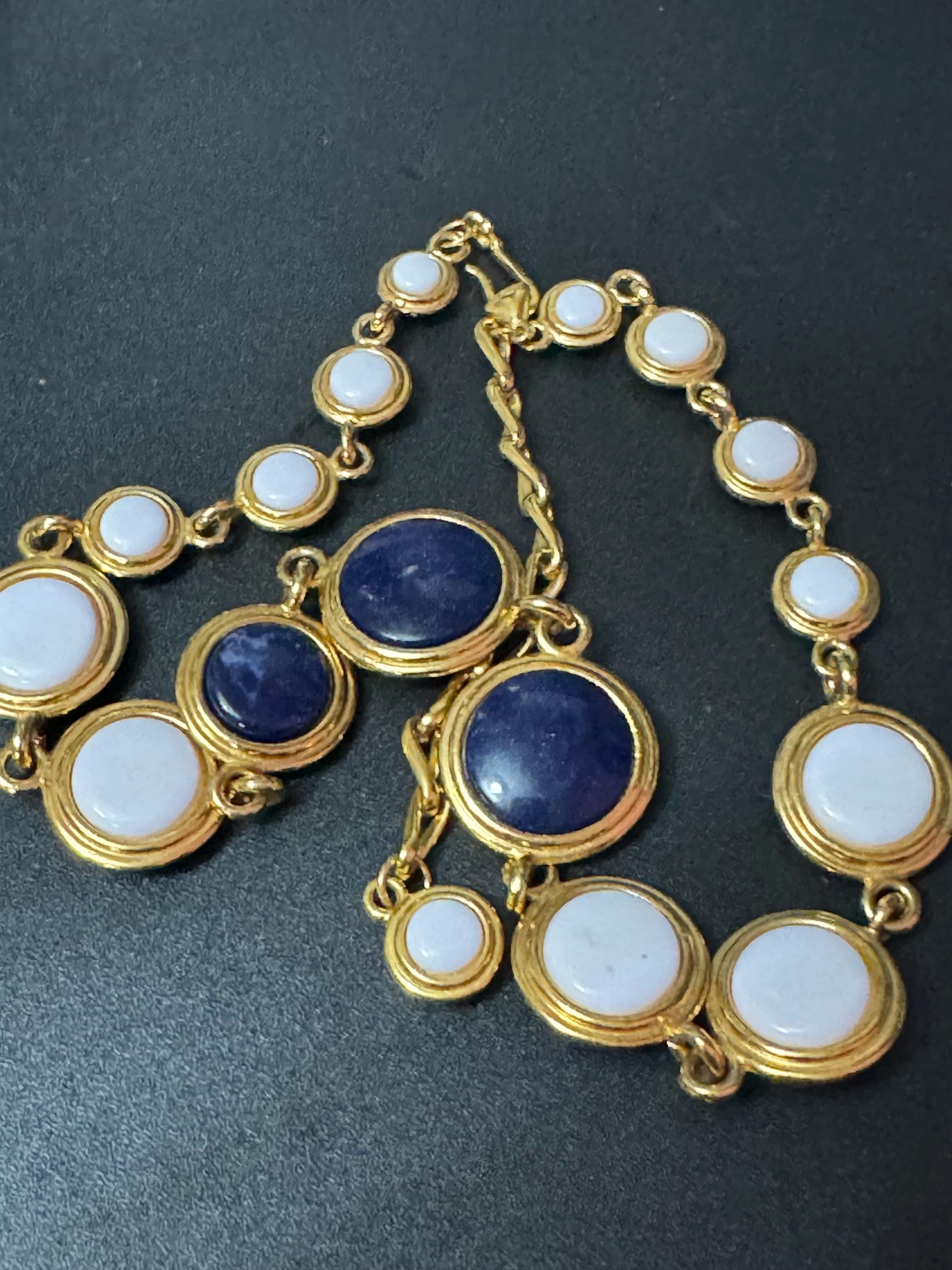 Liz Claiborne gold reversible blue and white disc necklace