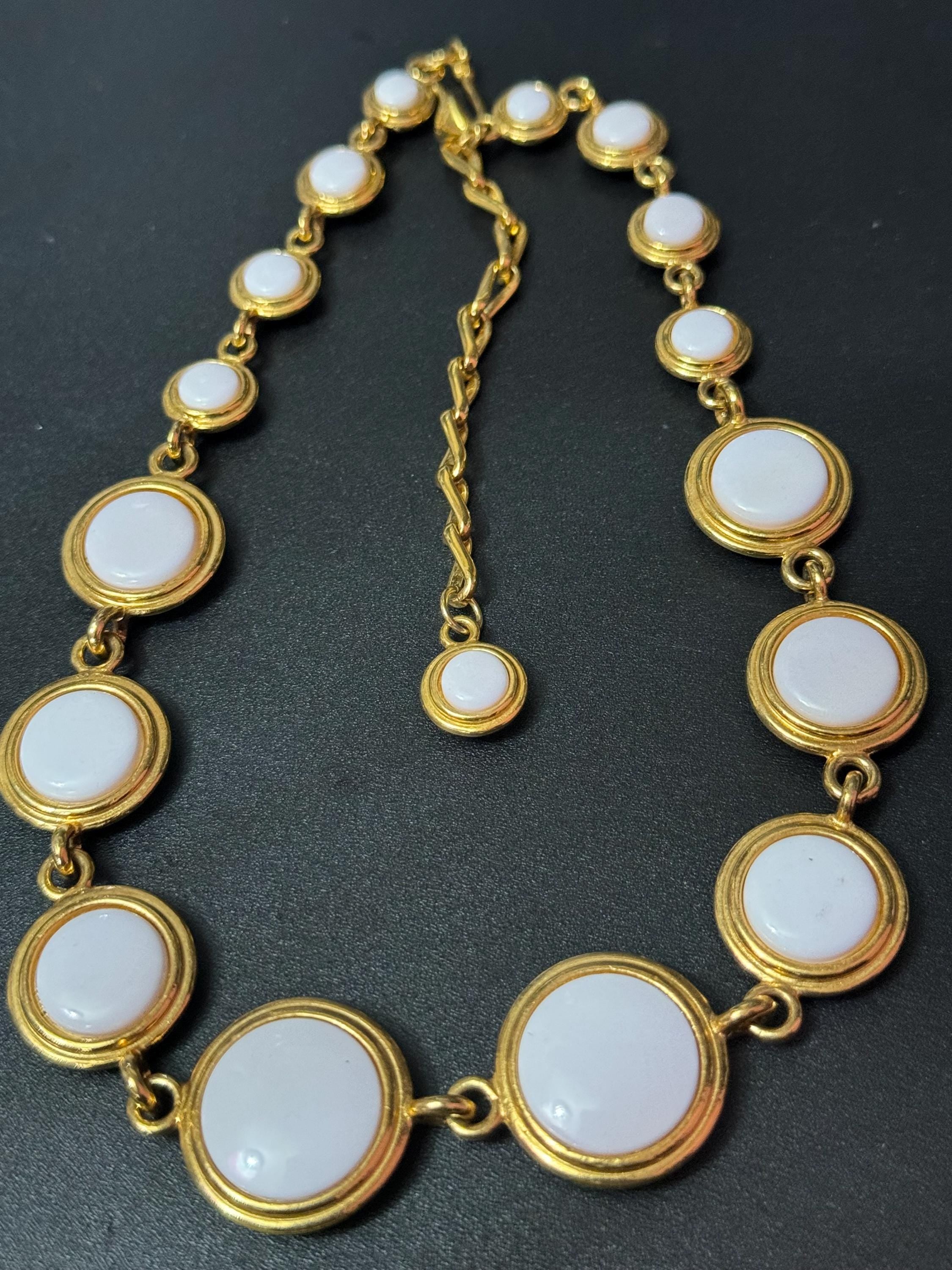 Liz Claiborne gold reversible blue and white disc necklace
