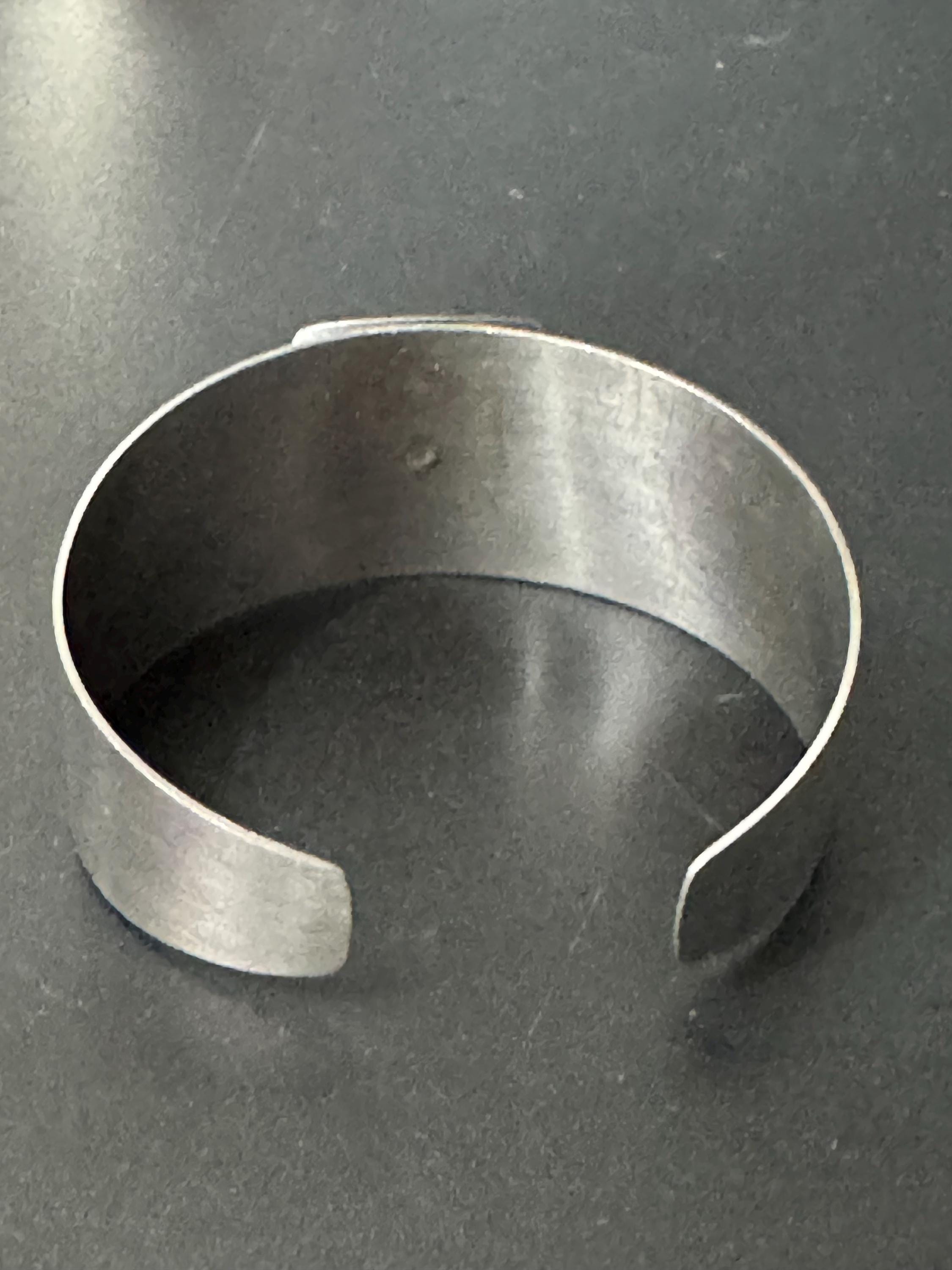 Brutalist blue gemstone stainless steel wide bangle 1970s modernist