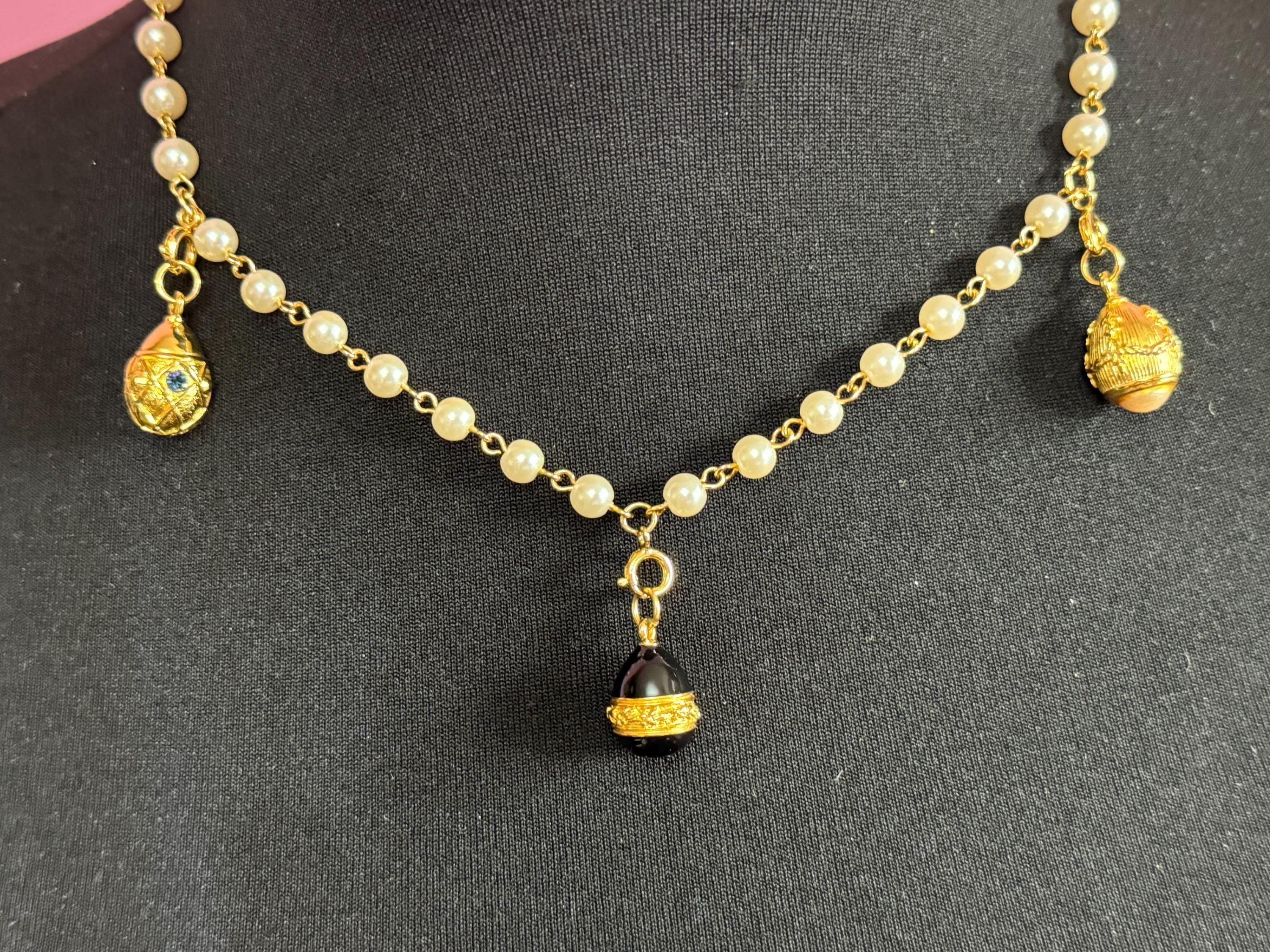 Joan Rivers glass pearl necklace with 3 faberge inspired enamelled egg pendants, signed