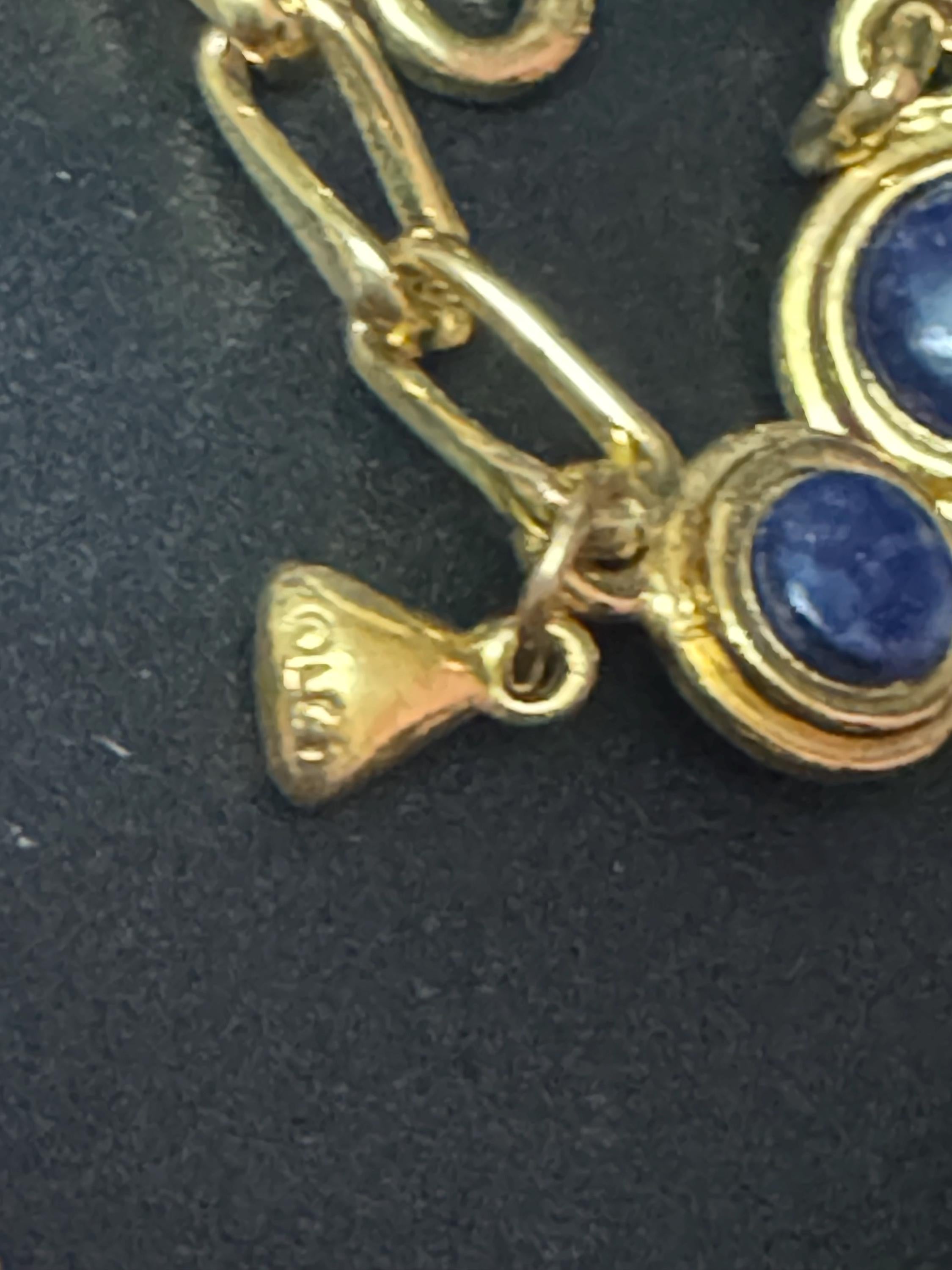 Liz Claiborne gold reversible blue and white disc necklace