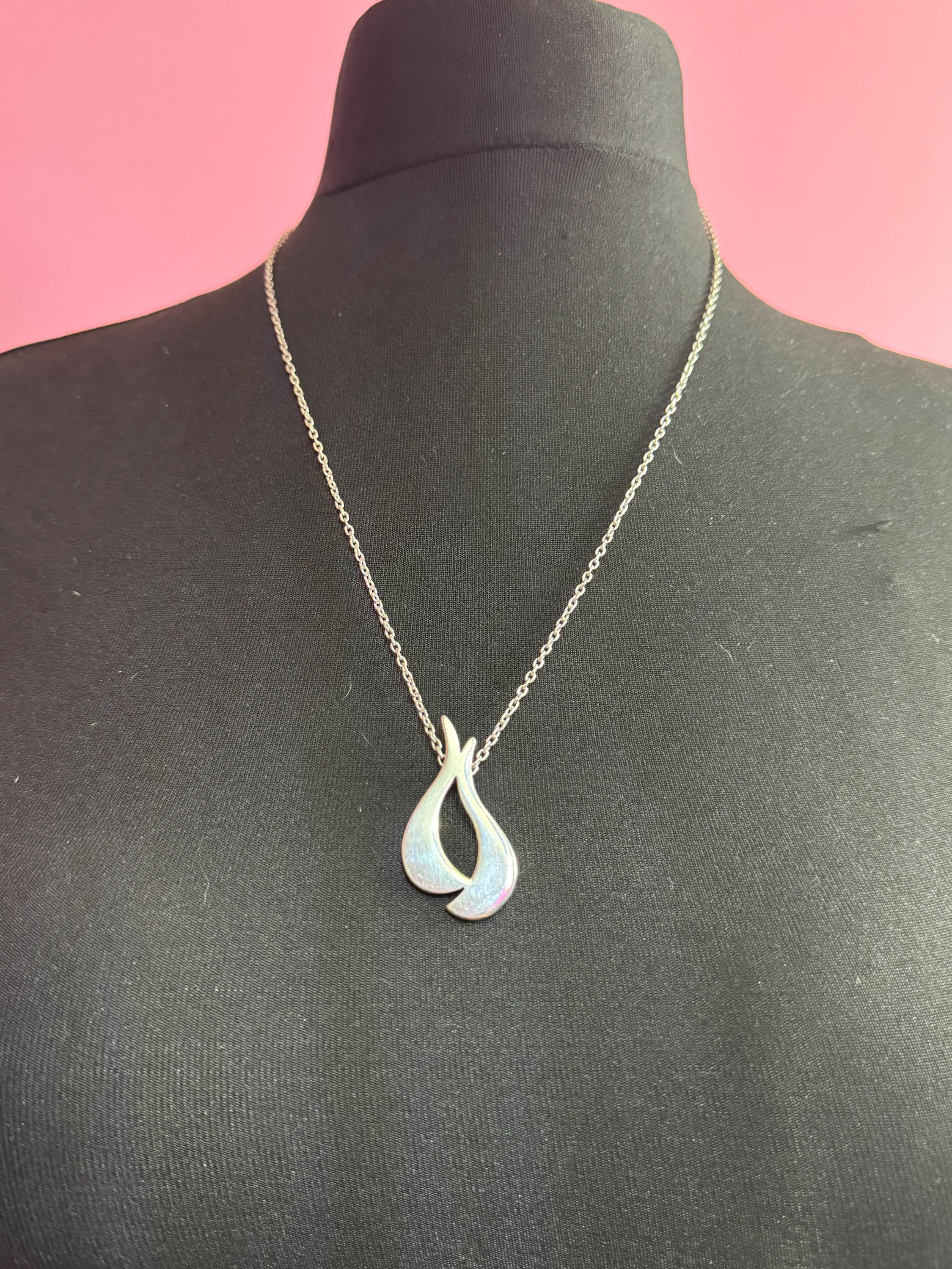 Abstract modernist pendant by Newbridge silverware on a 69cm 925 sterling silver chain
