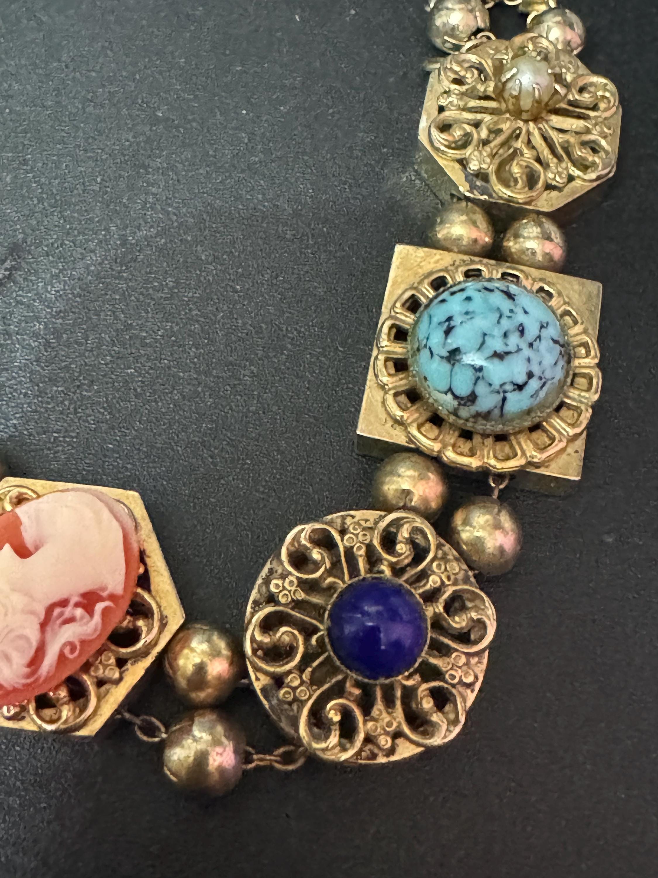 Signed Reinad Vintage Gold tone panel link cameo gemstone charm cabochon bracelet