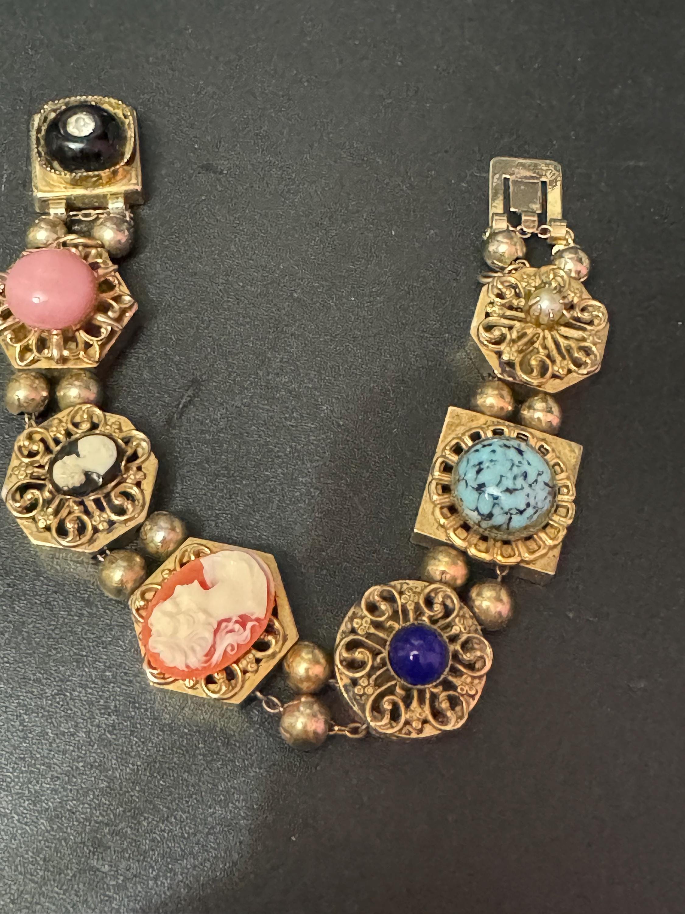 Signed Reinad Vintage Gold tone panel link cameo gemstone charm cabochon bracelet
