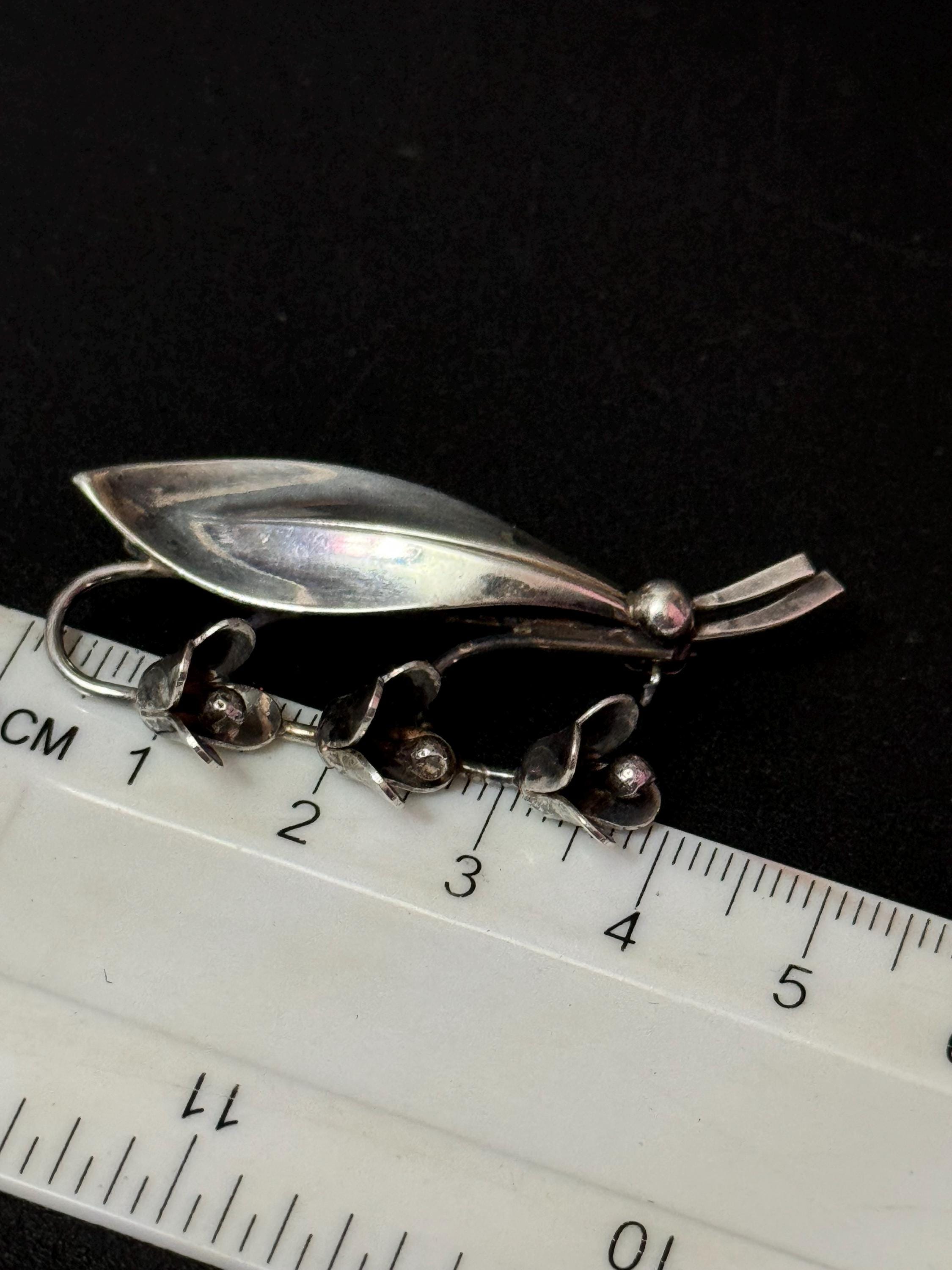 Sterling silver floral brooch 5.9 grams 4.75cm art deco