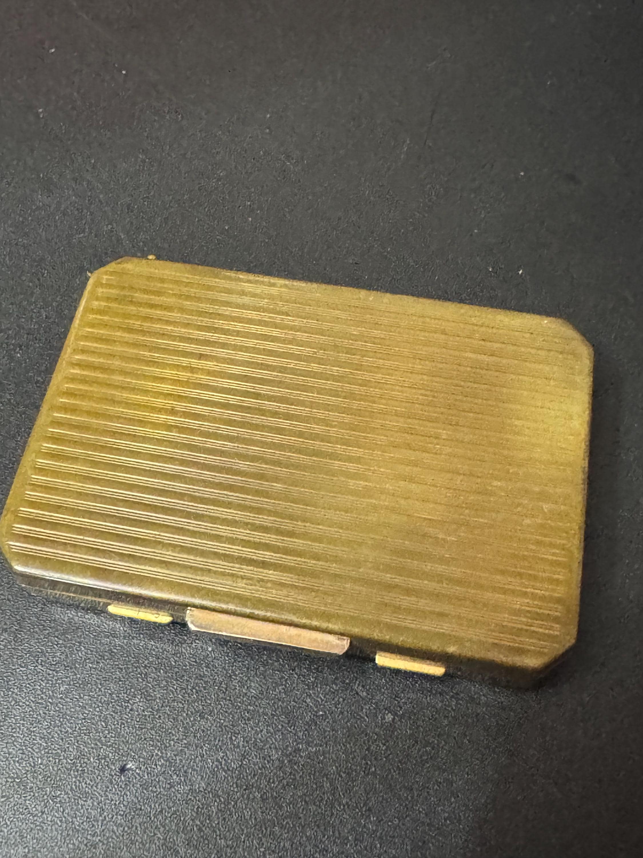 Vintage Stratton powder compact with ruby red baguette diamanté rhinestones one missing