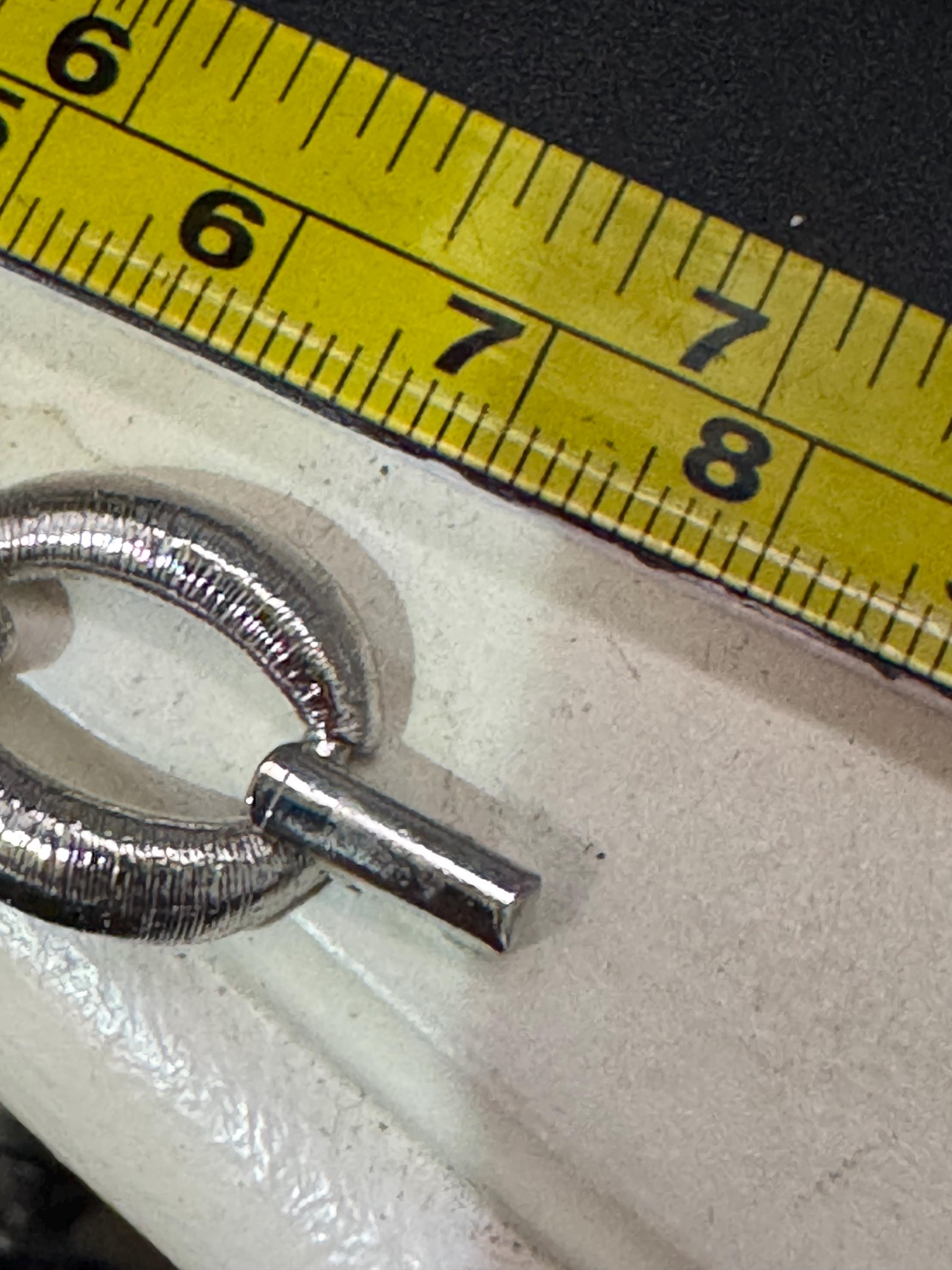 True vintage silver tone textured panel link bracelet and matching clip on drop earrings