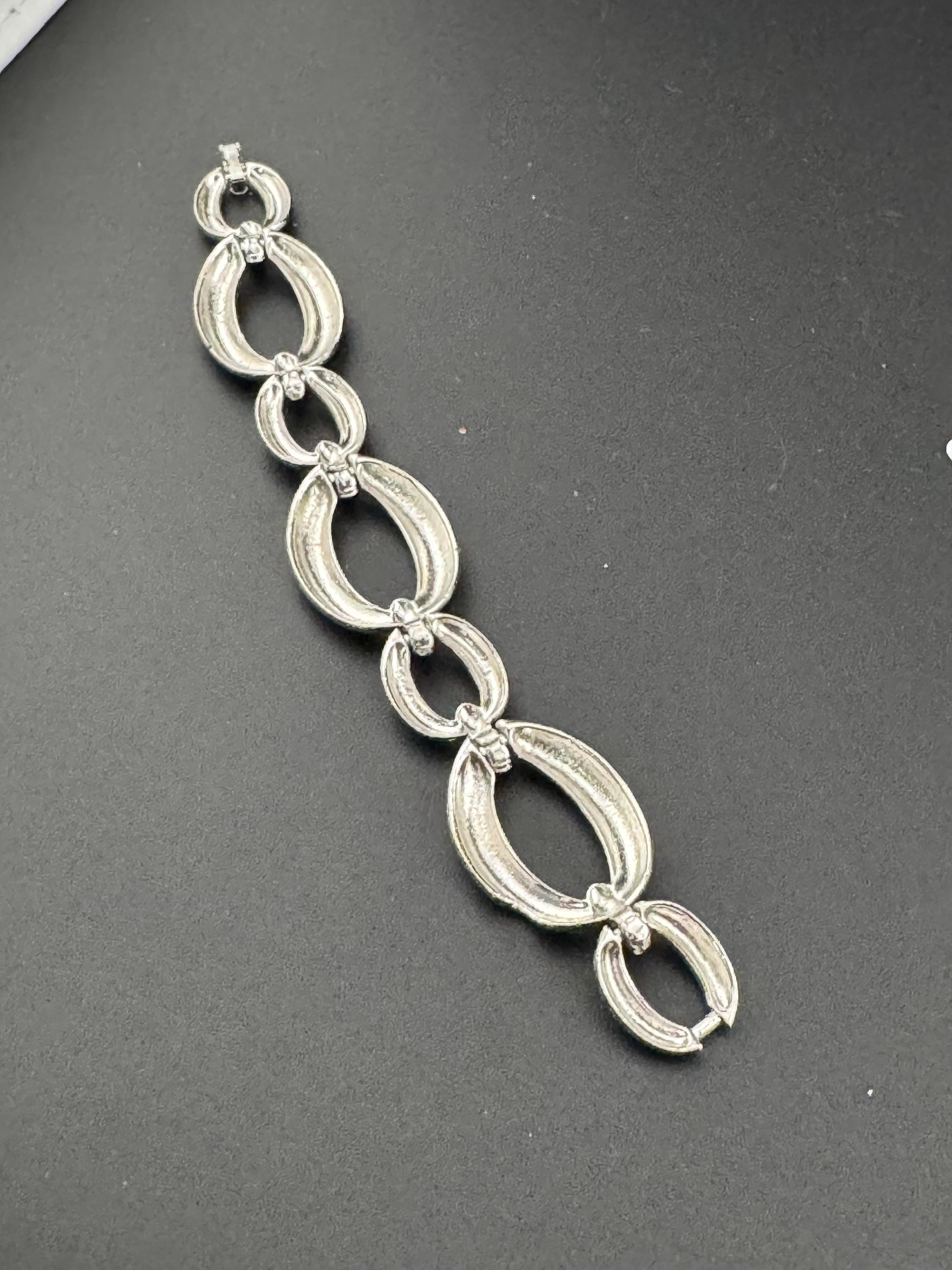 True vintage silver tone textured panel link bracelet and matching clip on drop earrings