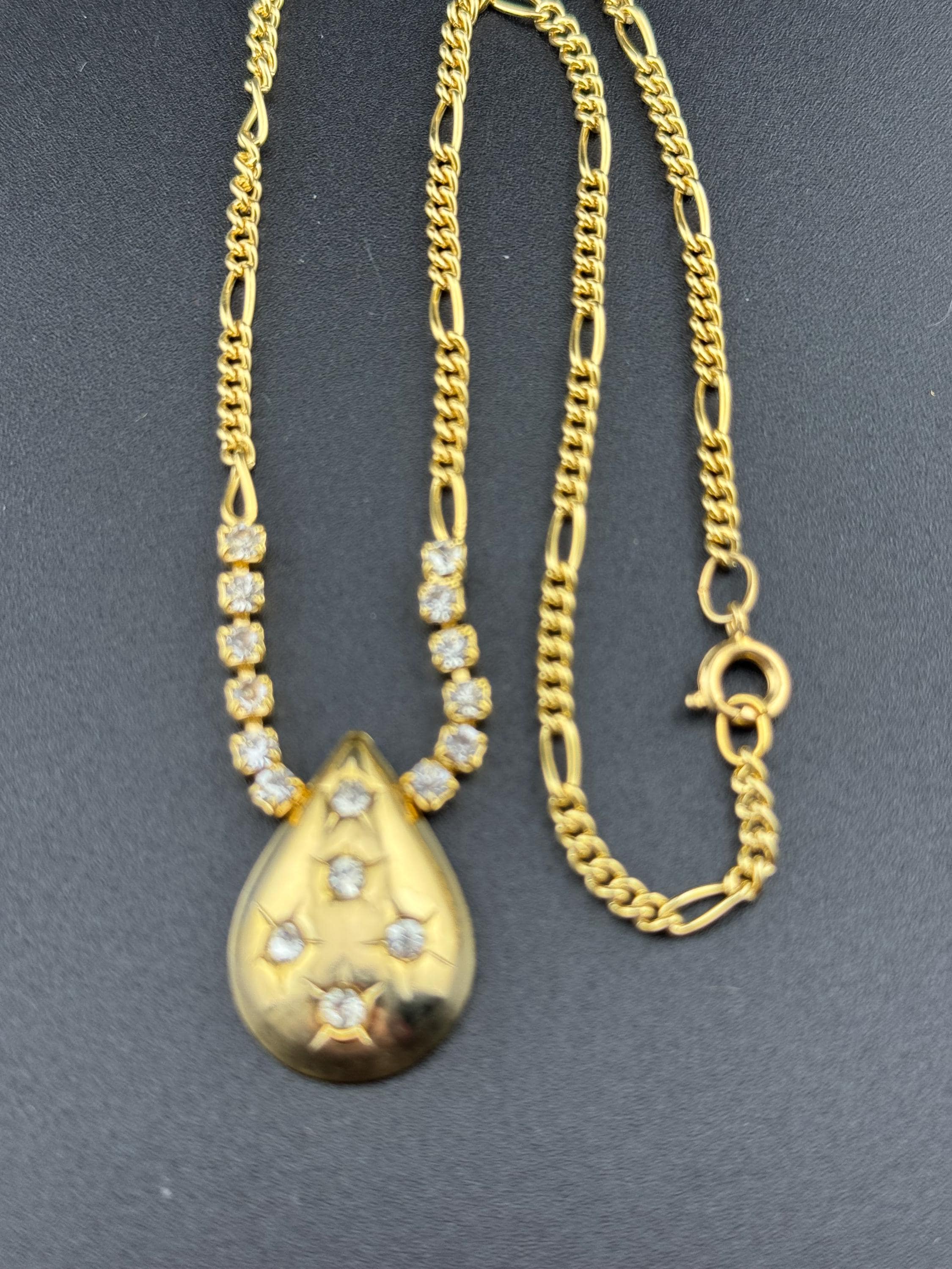 Gold Tone Figaro Chain Necklace: Rhinestone Star Teardrop Pendant