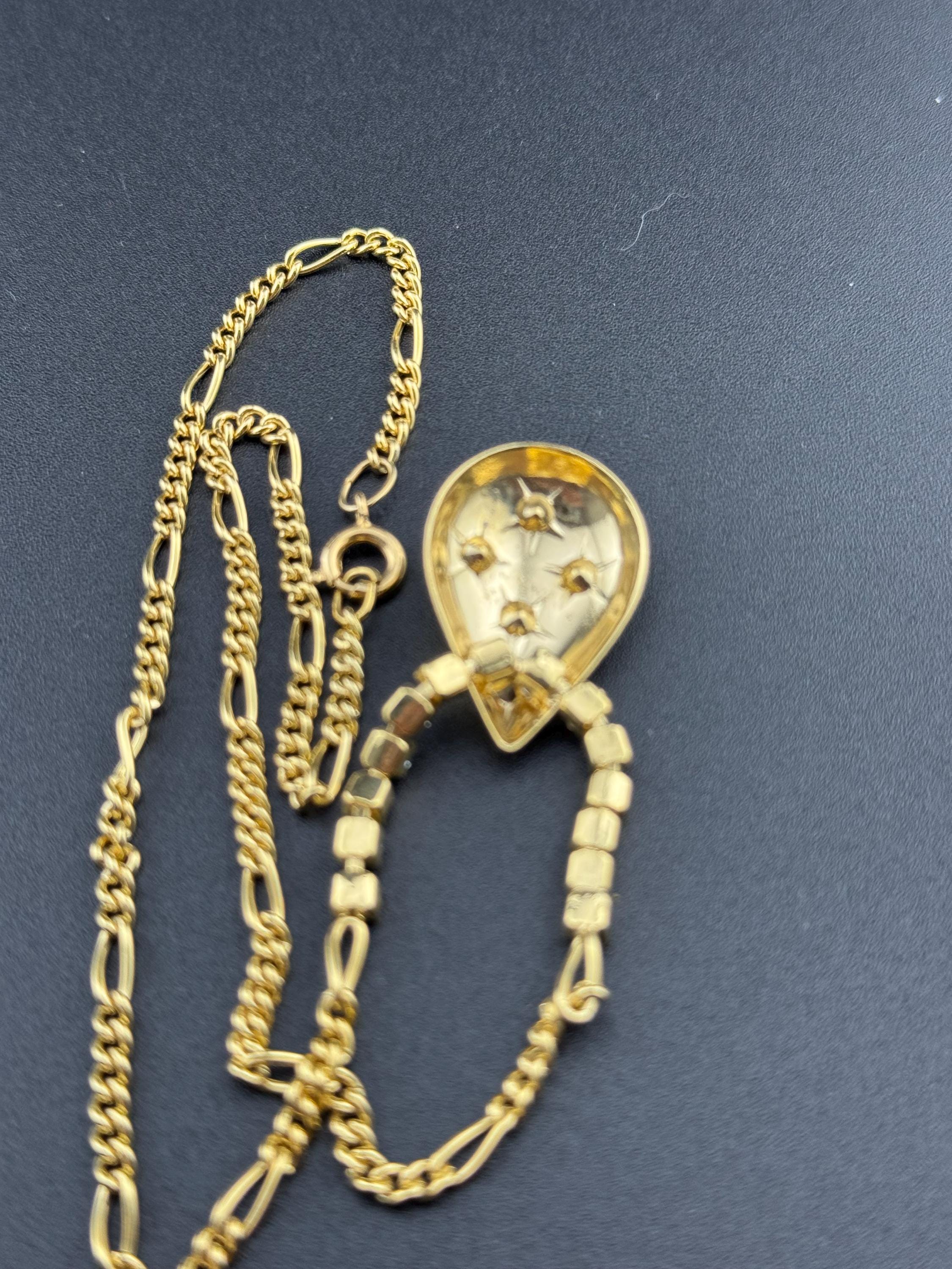 Gold Tone Figaro Chain Necklace: Rhinestone Star Teardrop Pendant