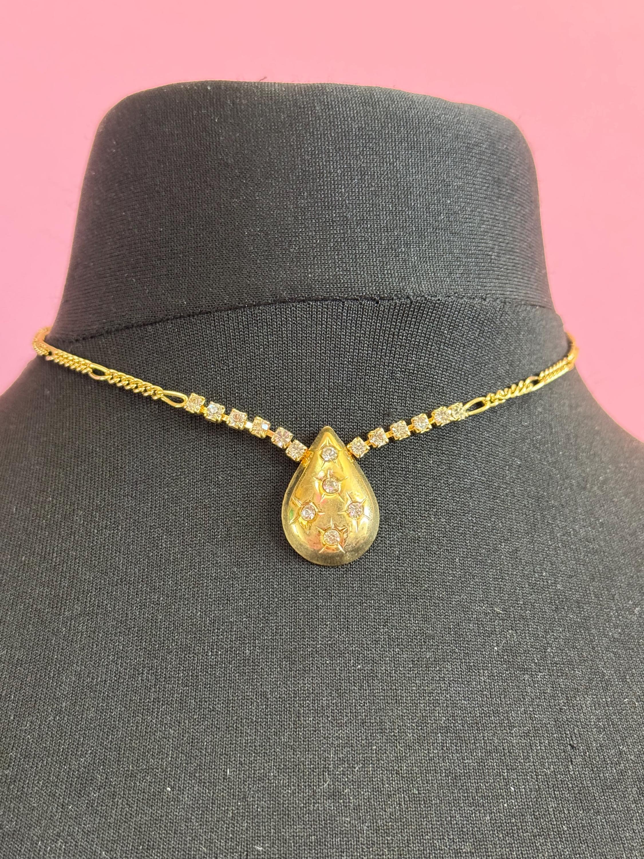 Gold Tone Figaro Chain Necklace: Rhinestone Star Teardrop Pendant