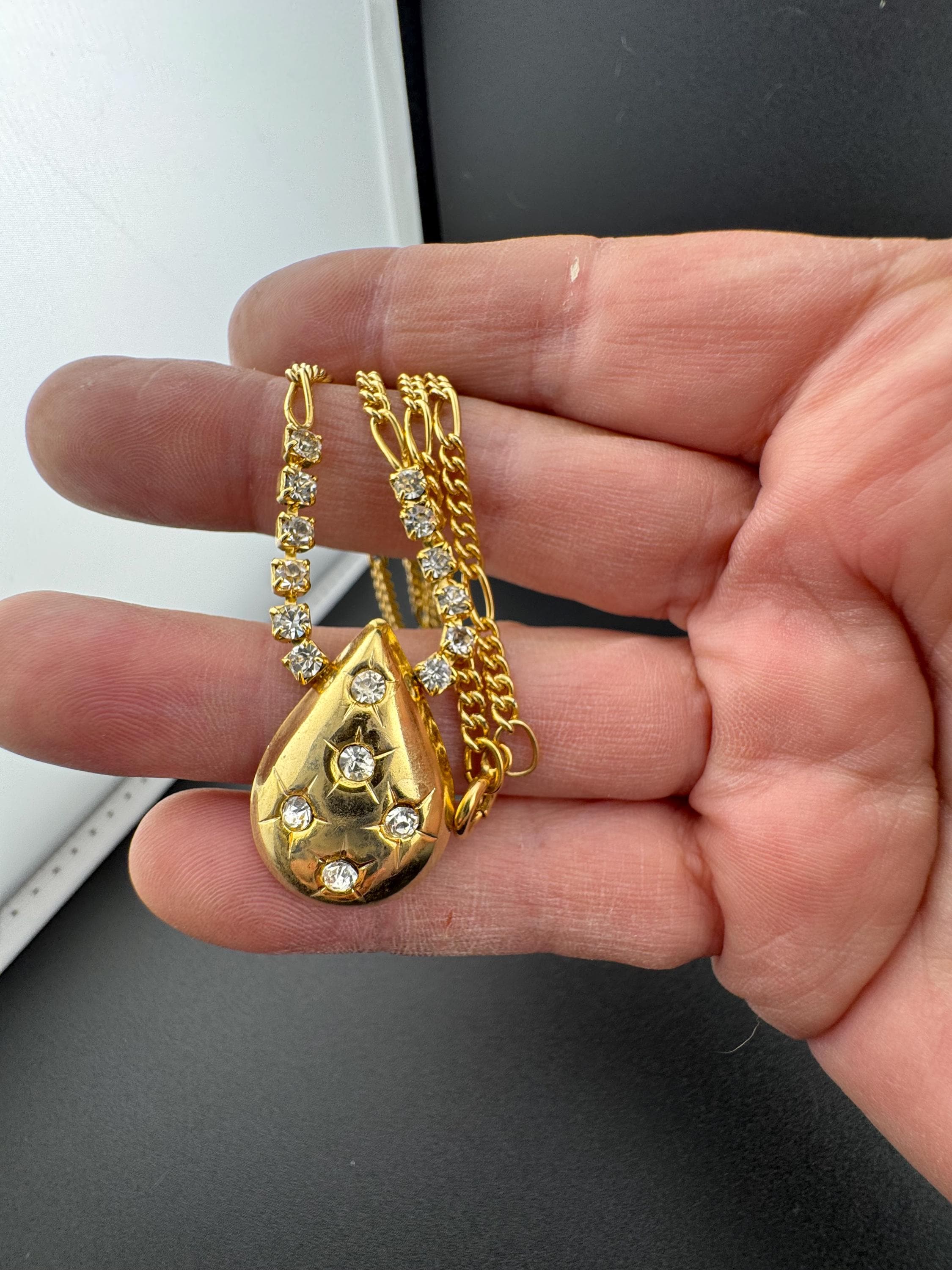 Gold Tone Figaro Chain Necklace: Rhinestone Star Teardrop Pendant