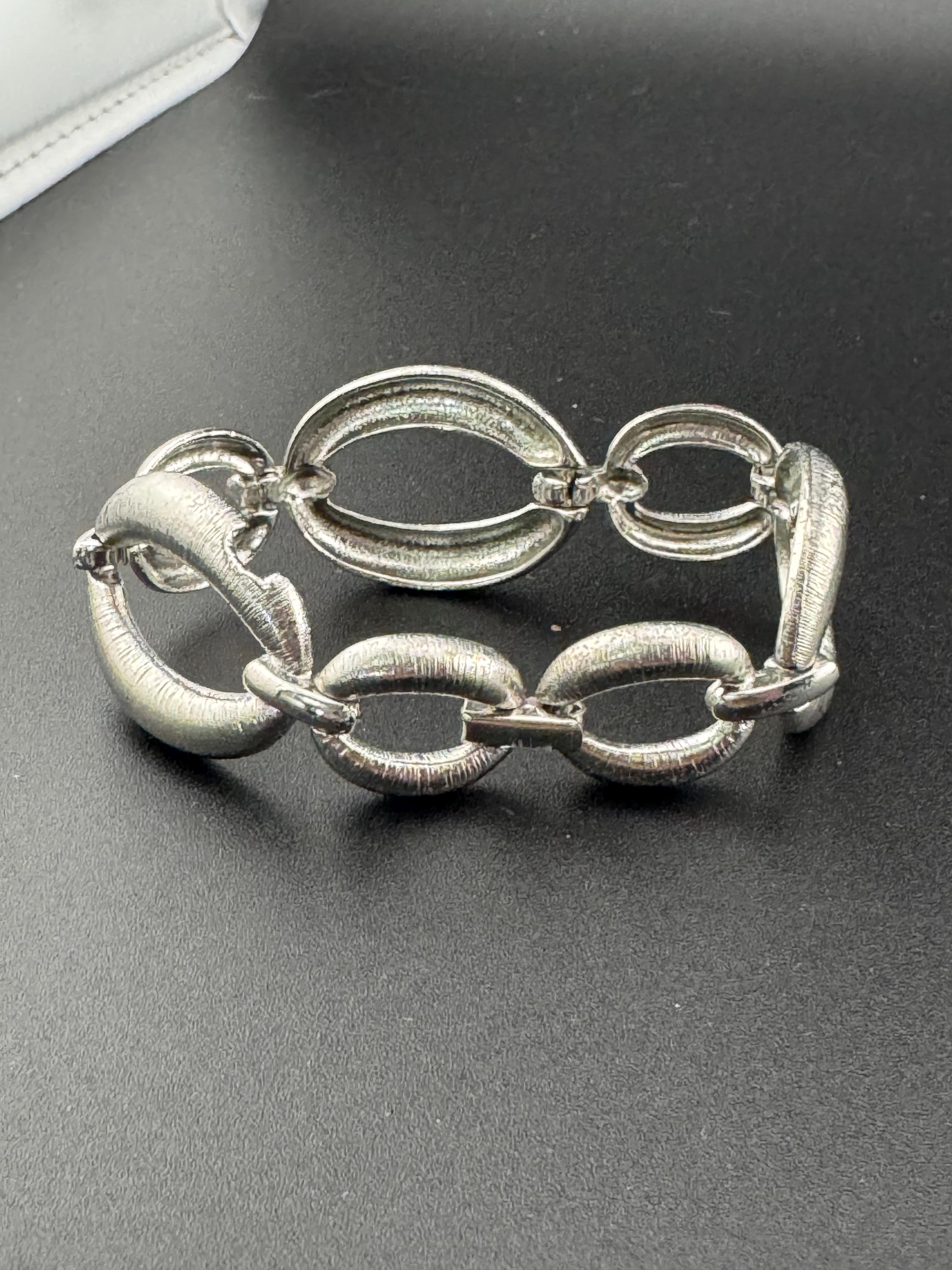True vintage silver tone textured panel link bracelet and matching clip on drop earrings