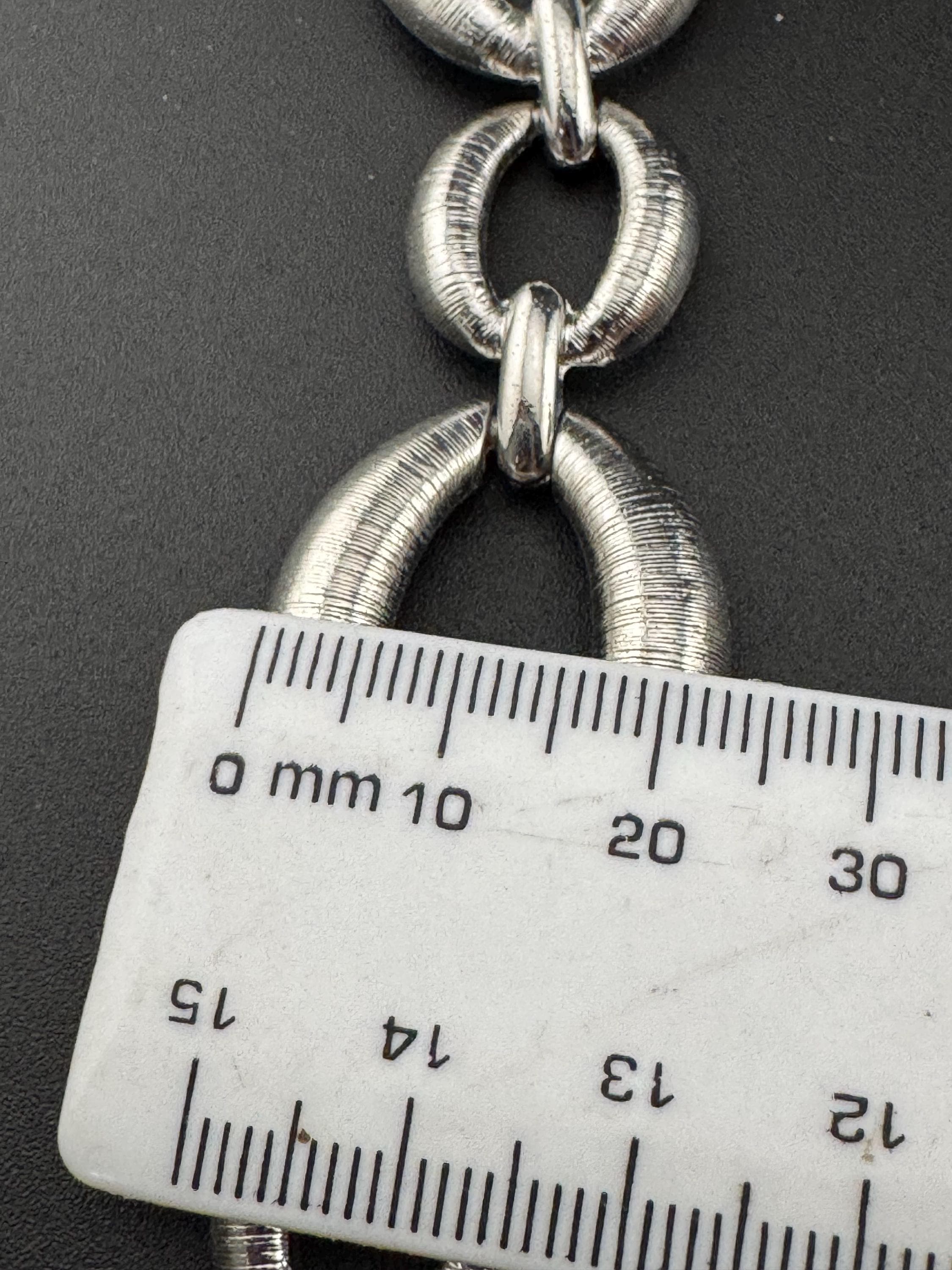 True vintage silver tone textured panel link bracelet and matching clip on drop earrings