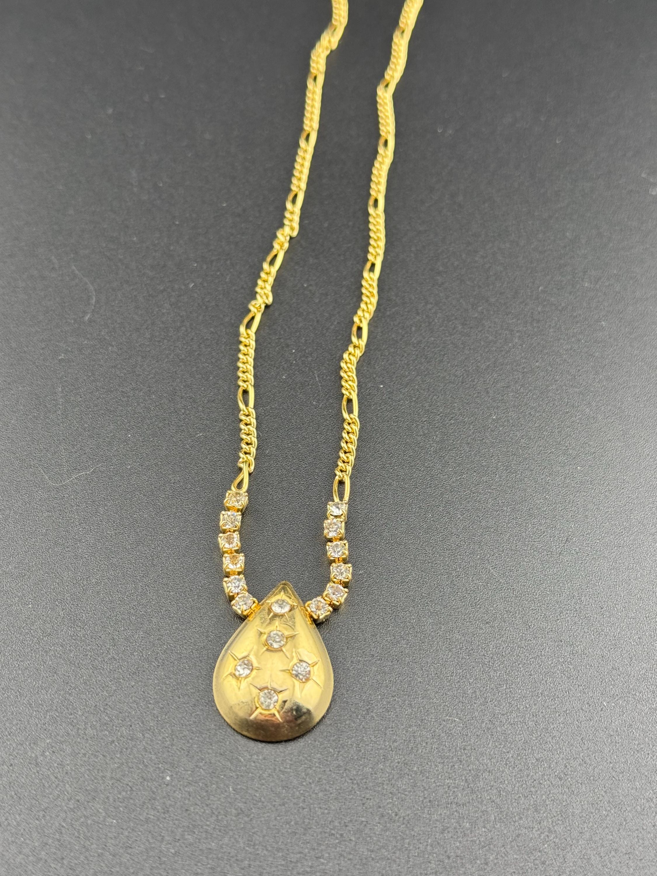 Gold Tone Figaro Chain Necklace: Rhinestone Star Teardrop Pendant