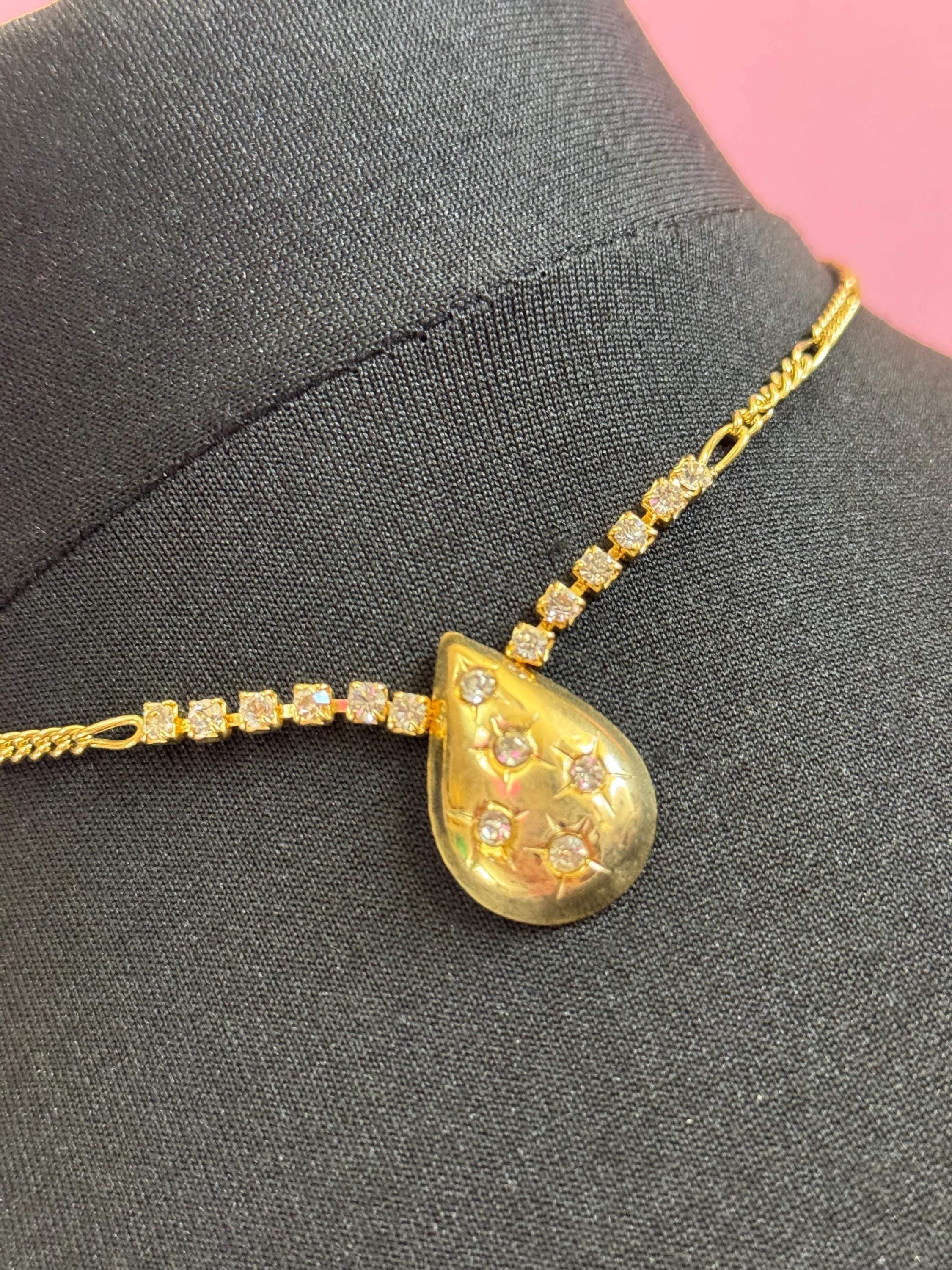 Gold Tone Figaro Chain Necklace: Rhinestone Star Teardrop Pendant