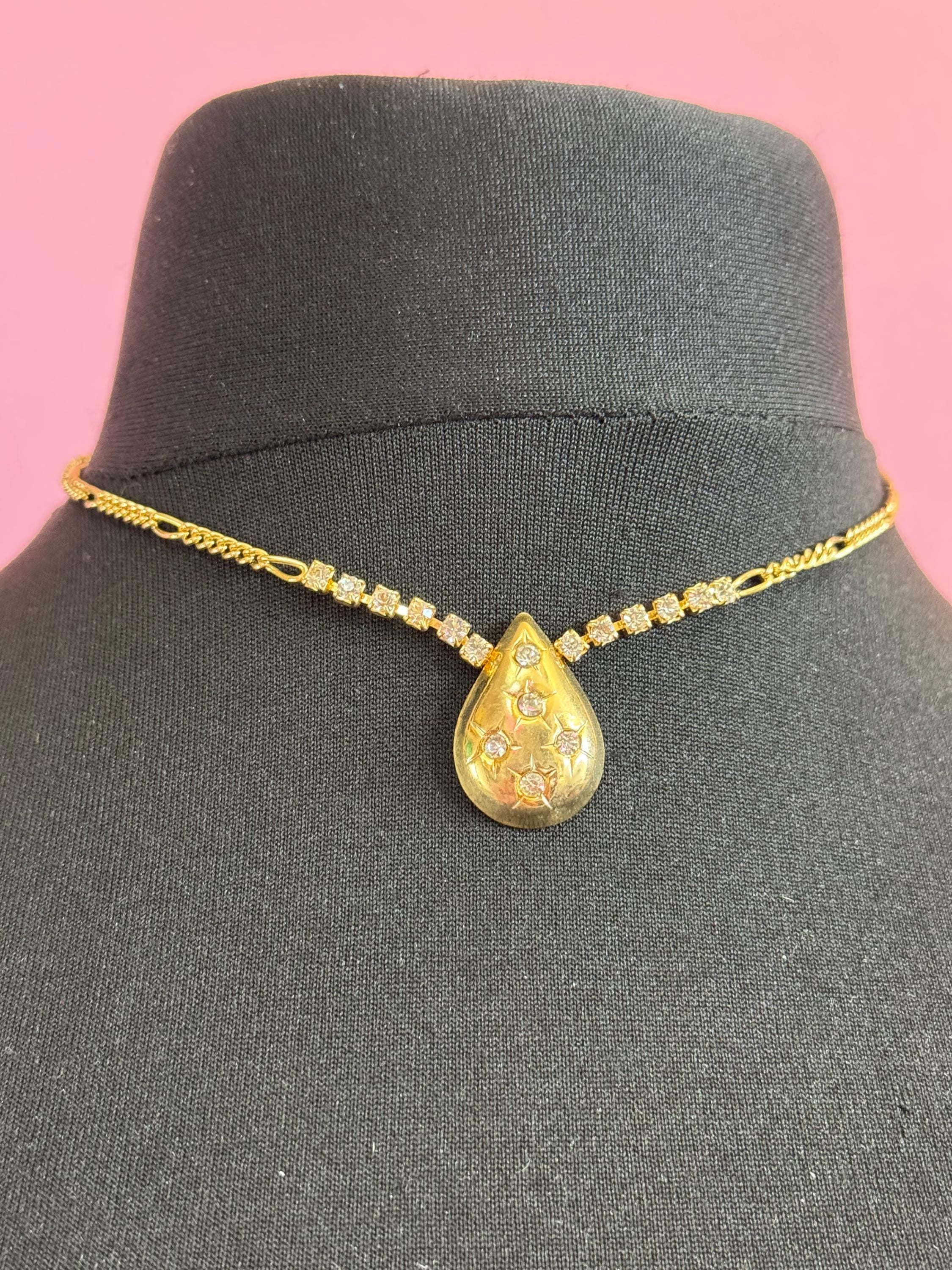 Gold Tone Figaro Chain Necklace: Rhinestone Star Teardrop Pendant