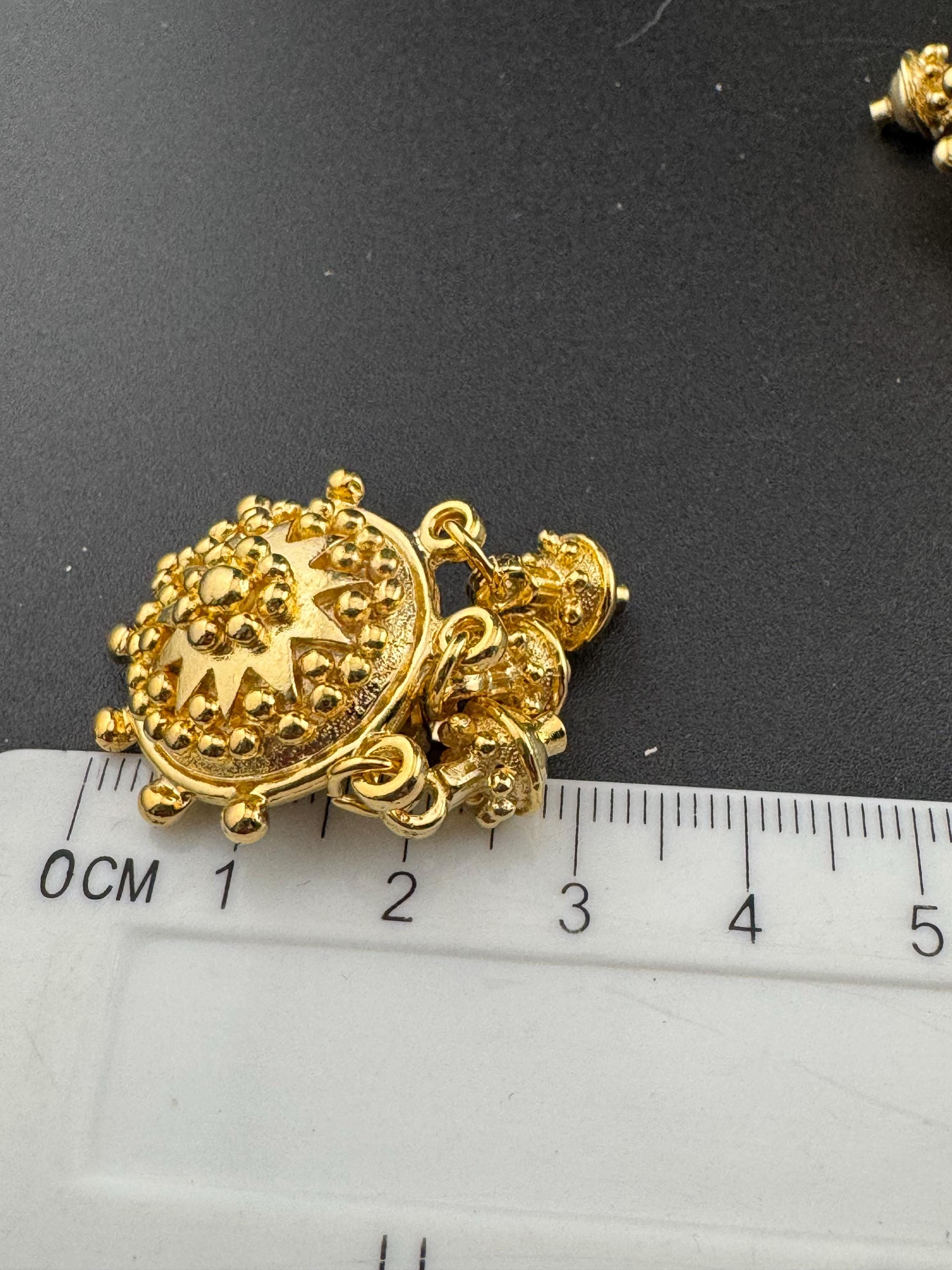 Etruscan star clip on earrings, 1990s 3cm gold tone drops