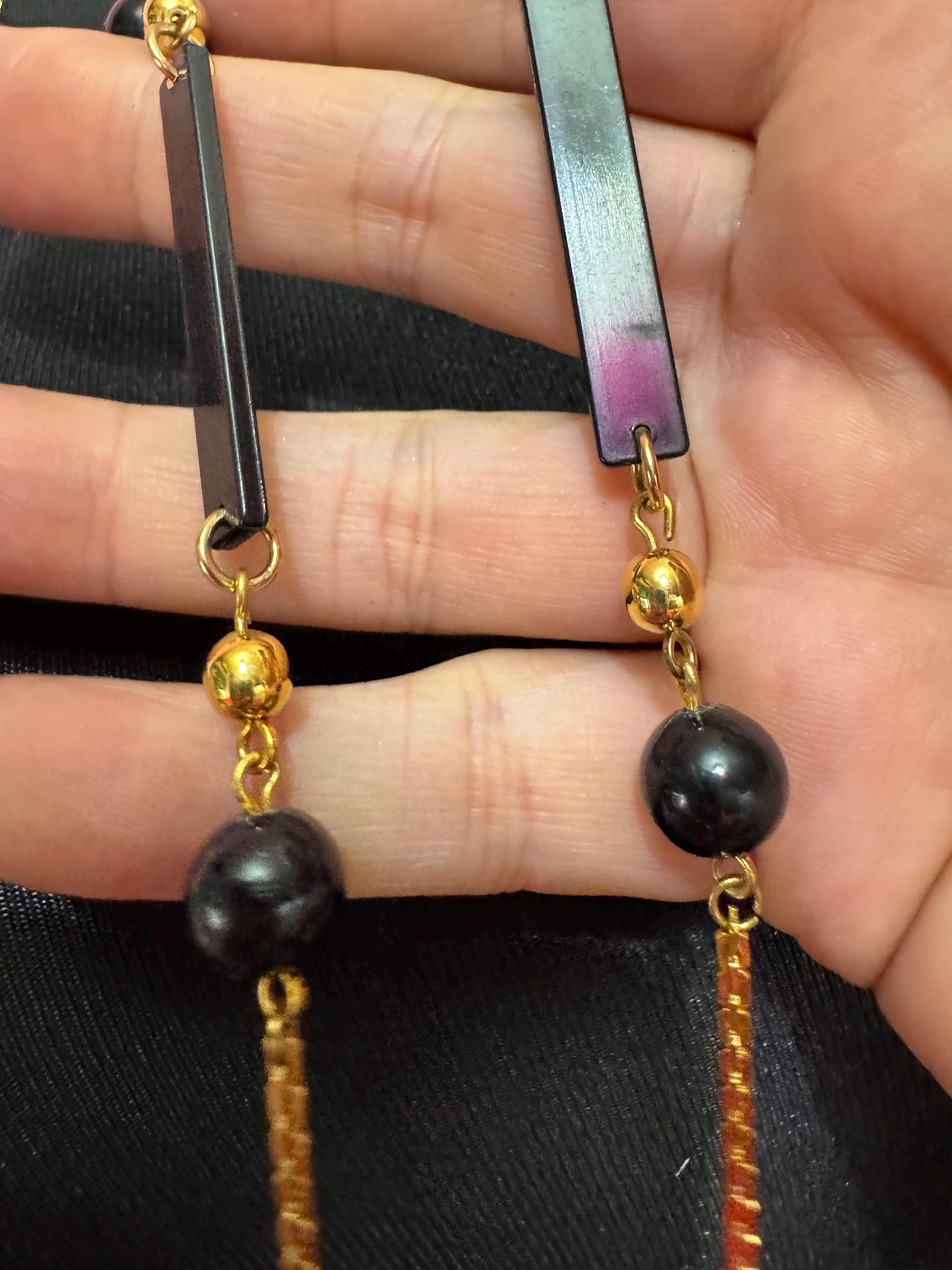True vintage 105cm long 1980s gold plated chain link black round and bar beaded station necklace old shop stock