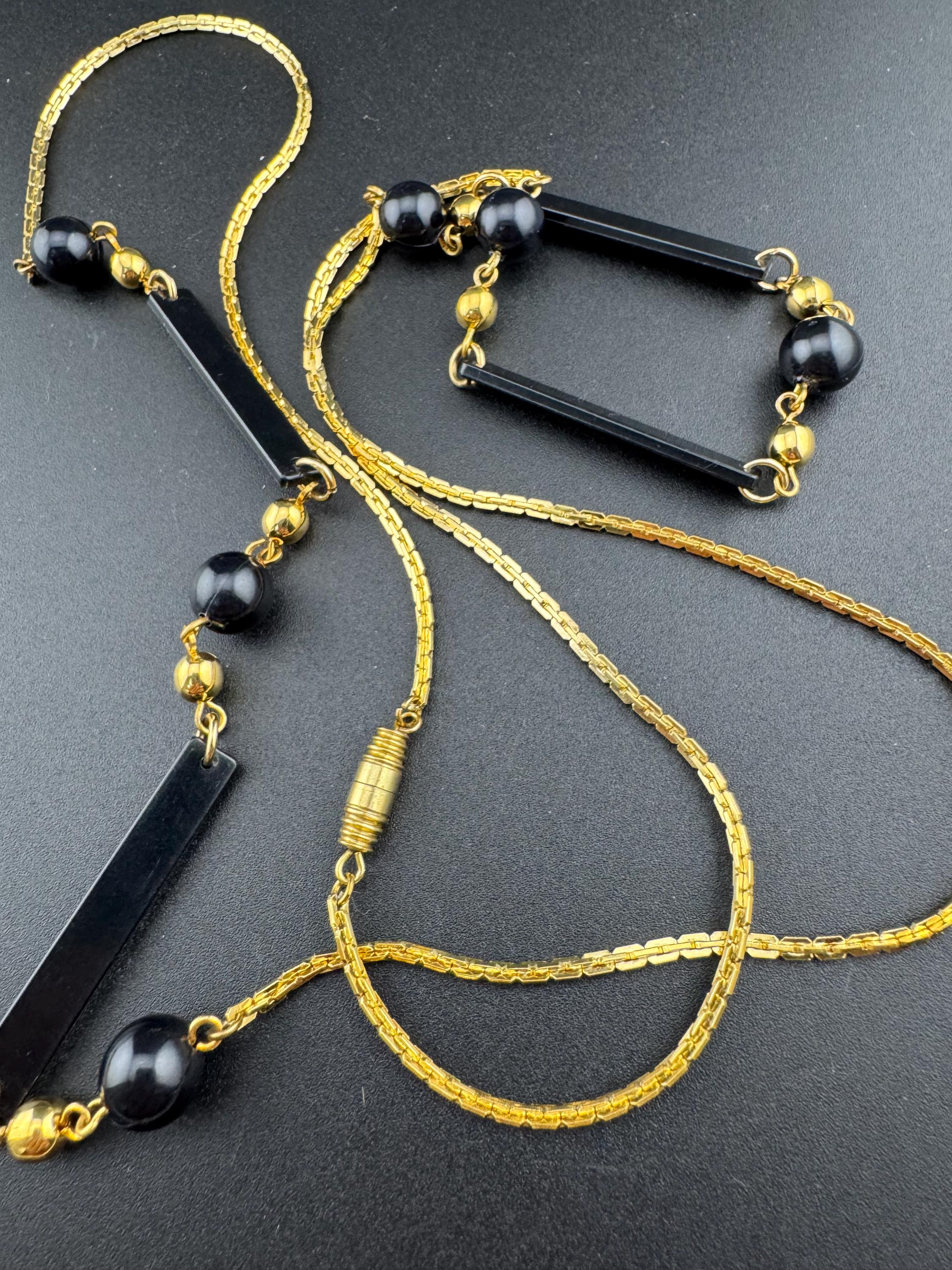 True vintage 105cm long 1980s gold plated chain link black round and bar beaded station necklace old shop stock