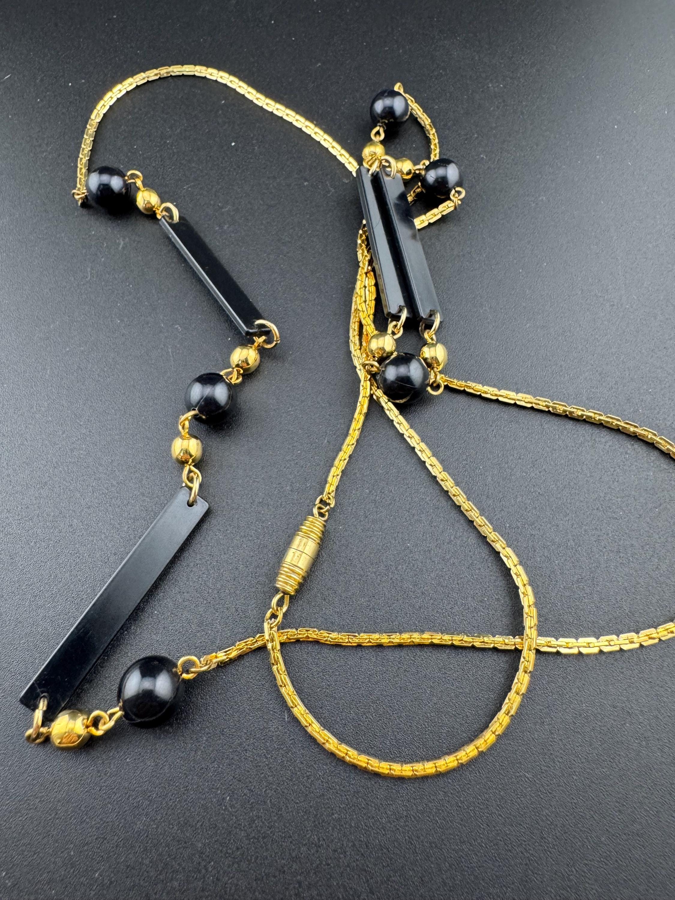 True vintage 105cm long 1980s gold plated chain link black round and bar beaded station necklace old shop stock