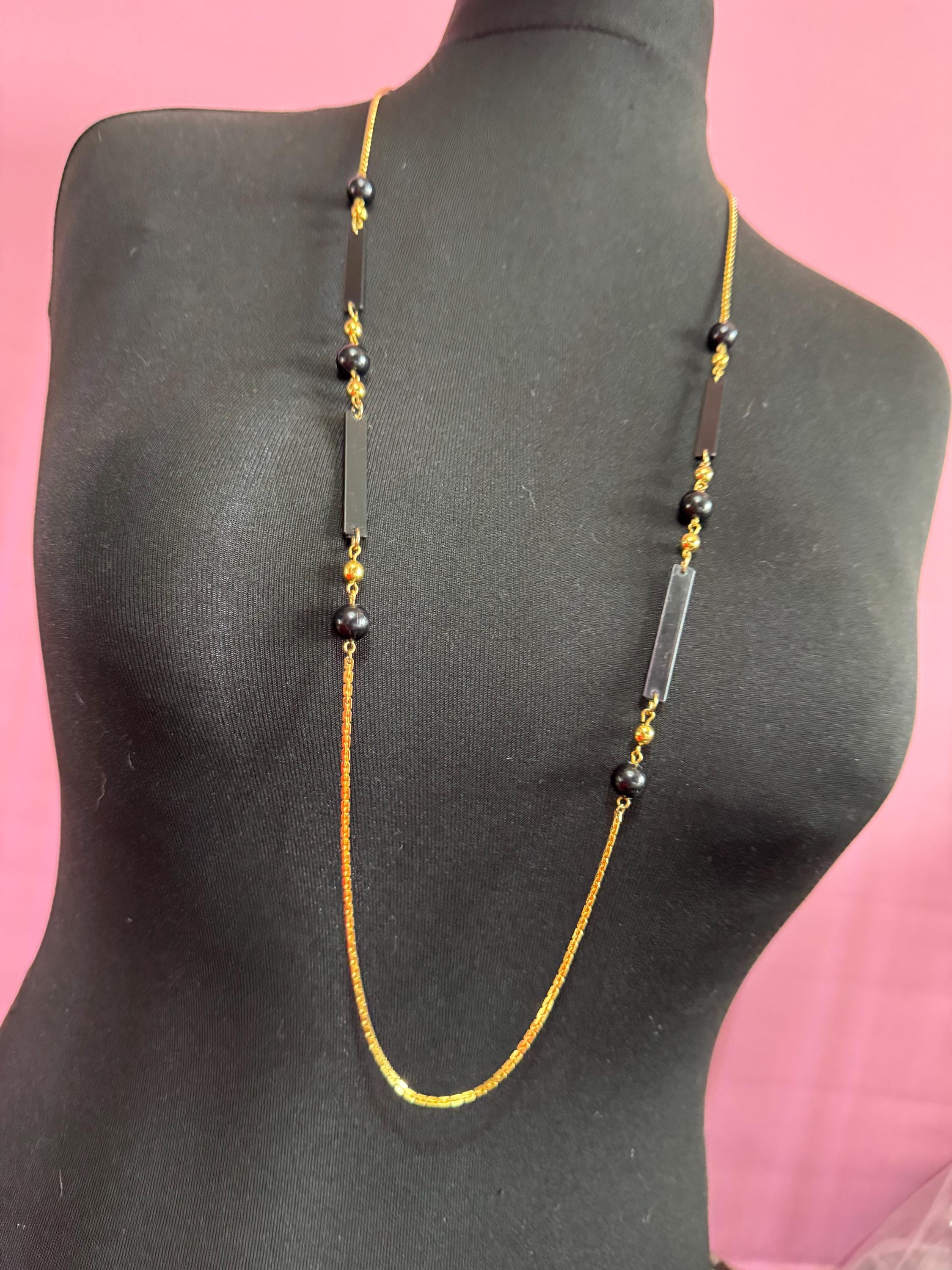 True vintage 105cm long 1980s gold plated chain link black round and bar beaded station necklace old shop stock