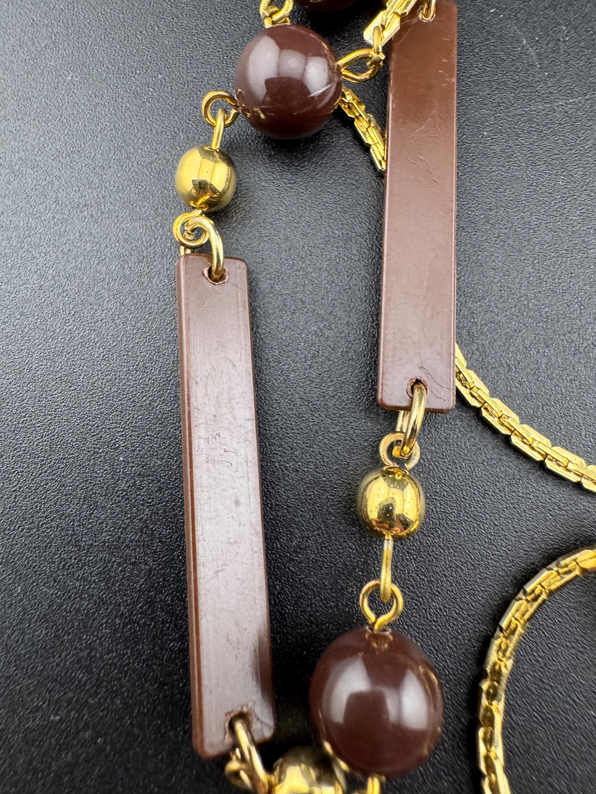 True vintage 105cm long 1980s gold plated chain link brown round and bar beaded station necklace old shop stock