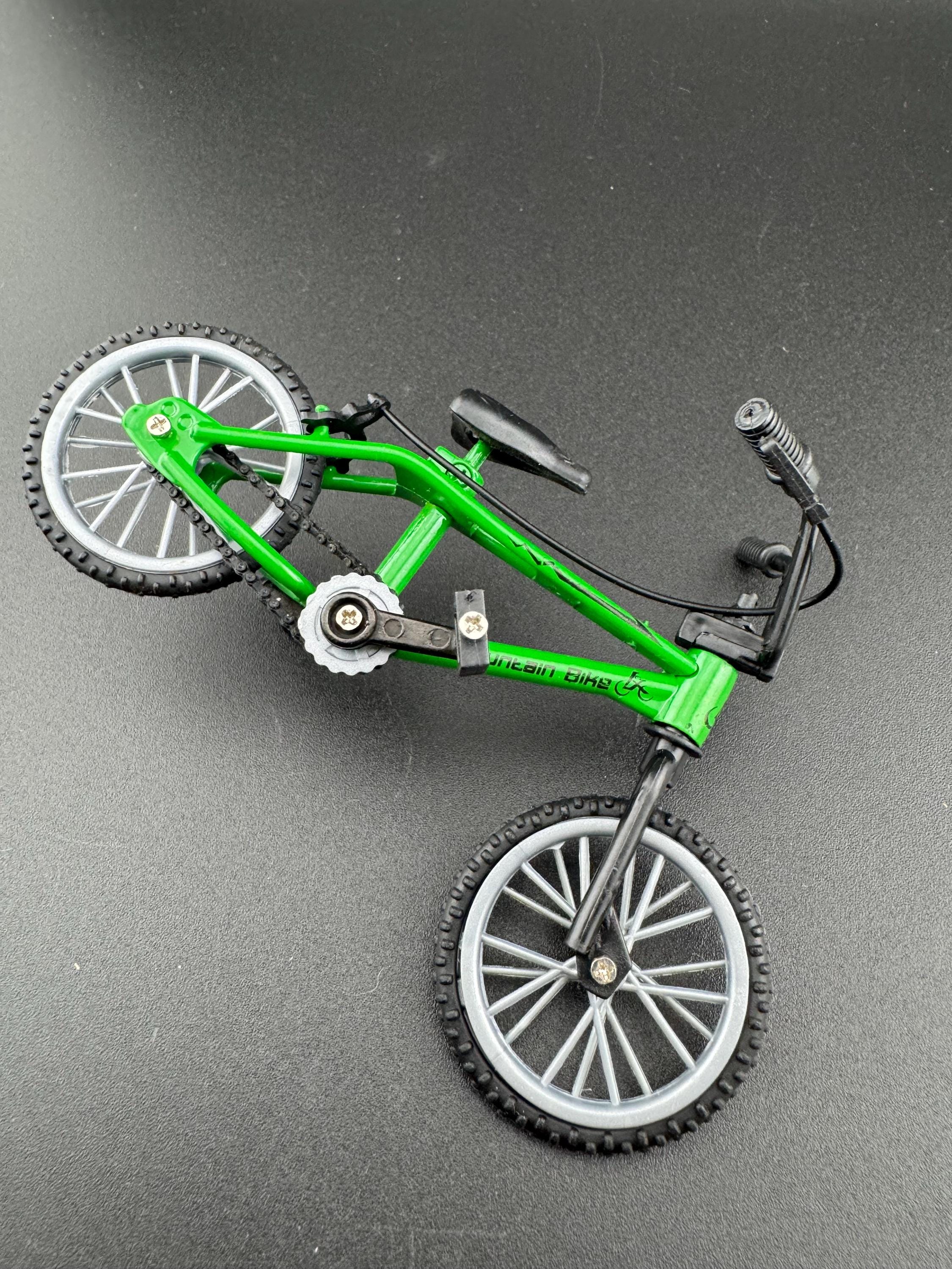 Miniature plastic green mountain bike BMX cake topper decoration