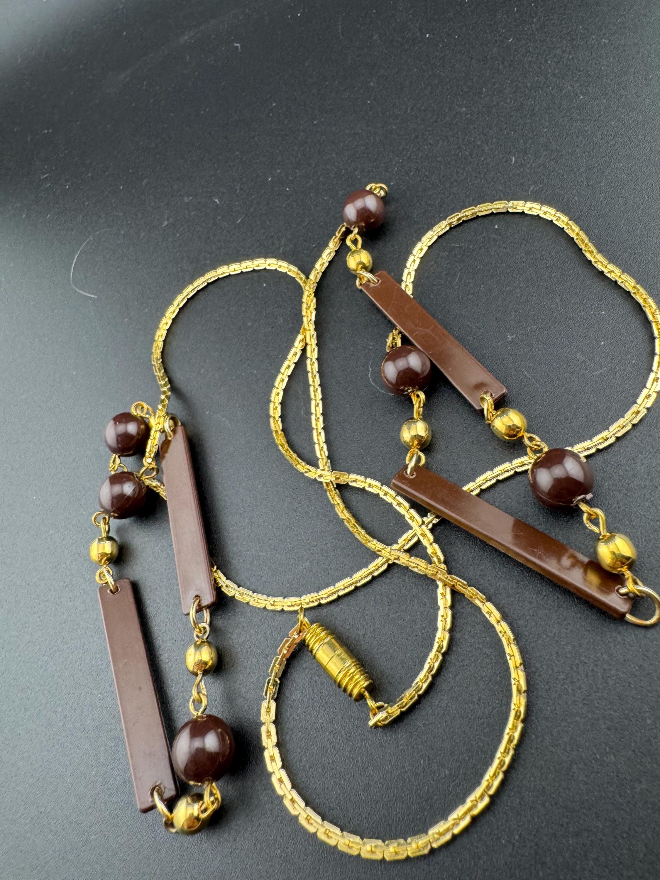 True vintage 105cm long 1980s gold plated chain link brown round and bar beaded station necklace old shop stock