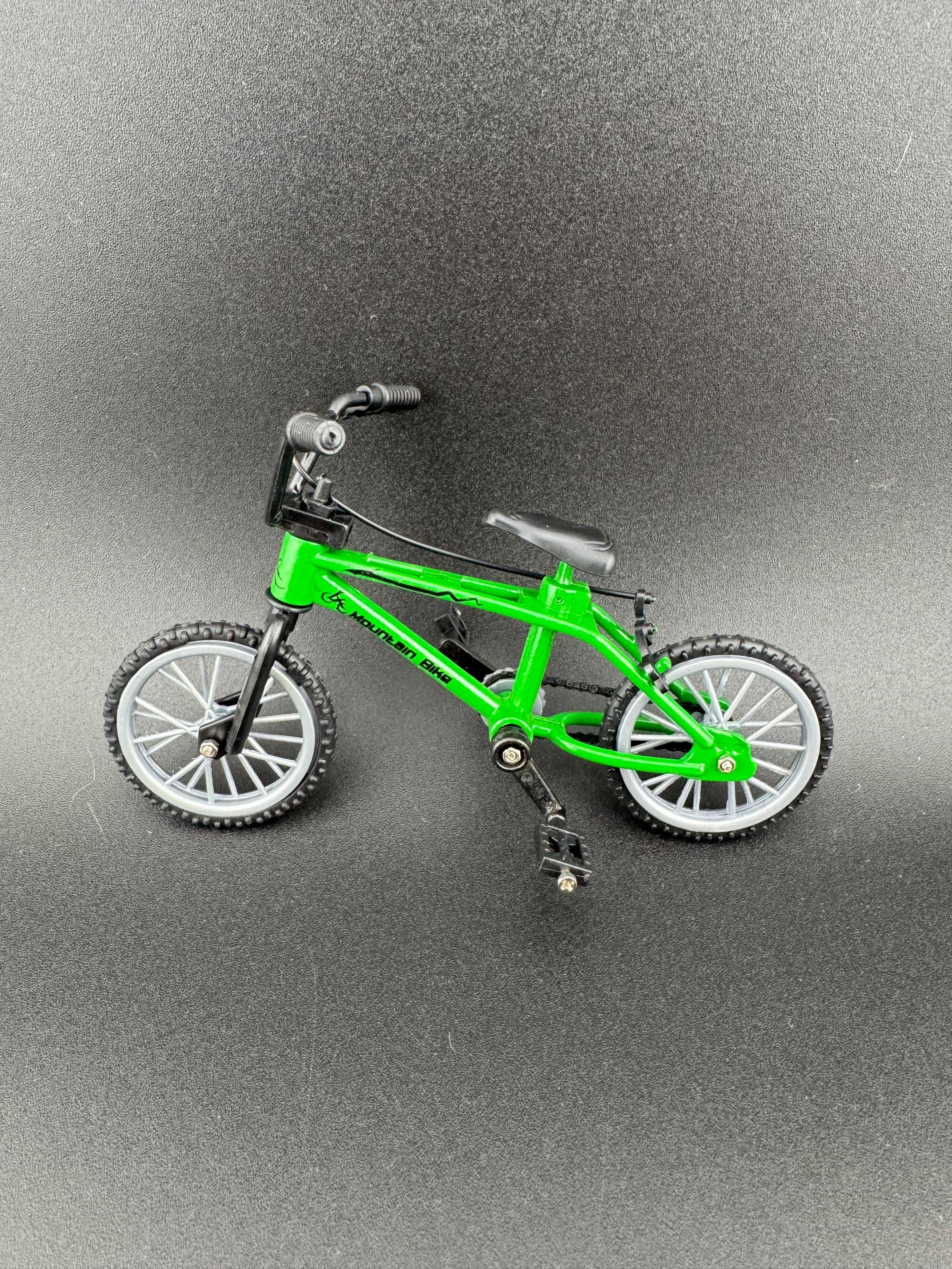 Miniature plastic green mountain bike BMX cake topper decoration