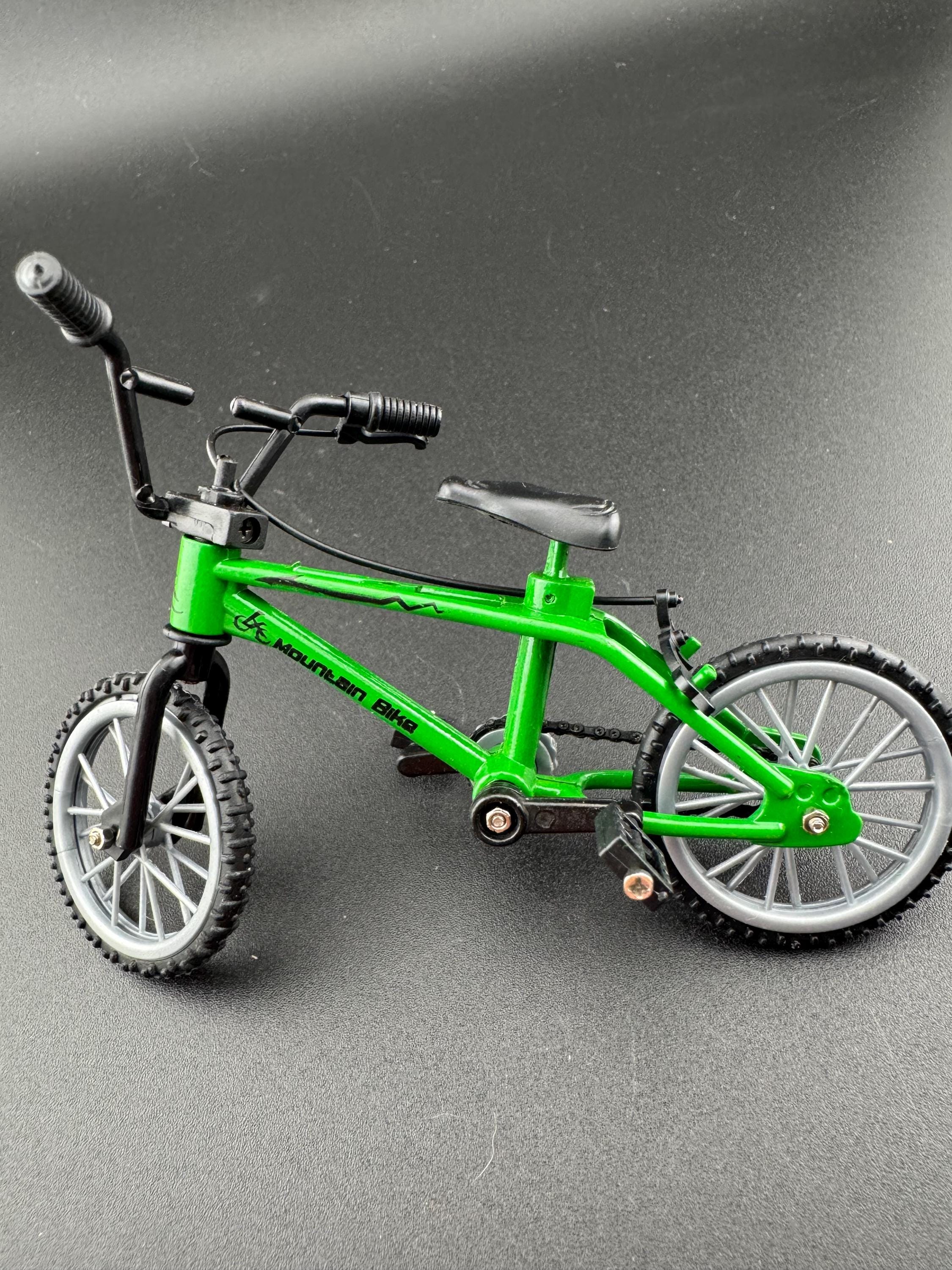 Miniature plastic green mountain bike BMX cake topper decoration