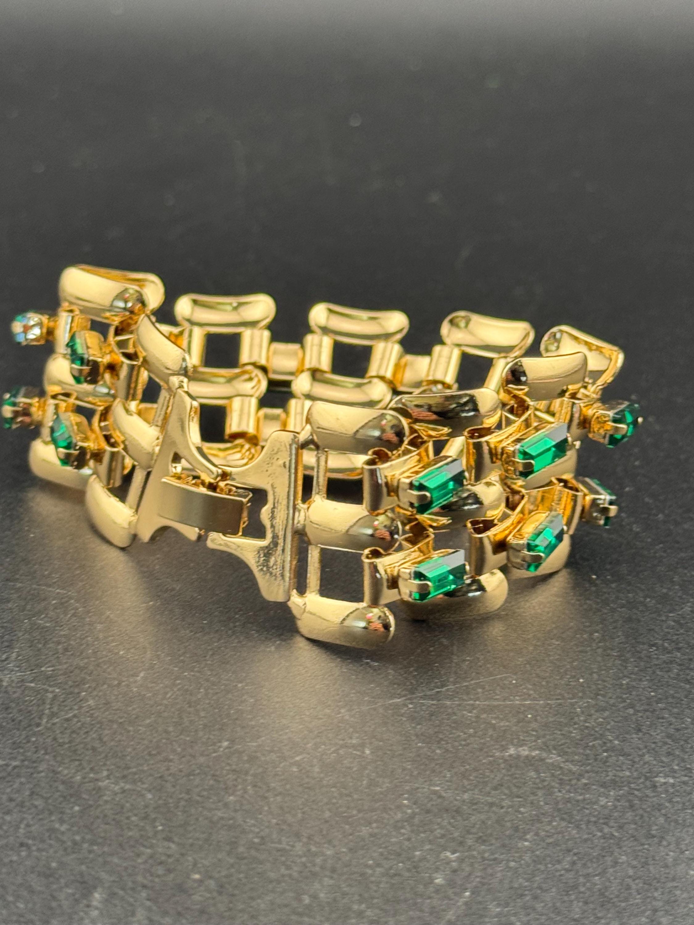 Wide lightweight aluminium Flat brick panther link gold tone bracelet with emerald baguette glass rhinestones