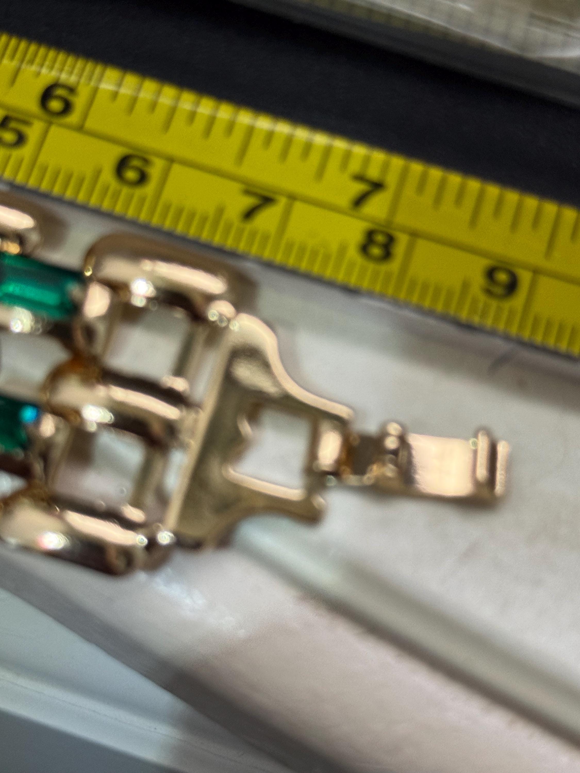 Wide lightweight aluminium Flat brick panther link gold tone bracelet with emerald baguette glass rhinestones