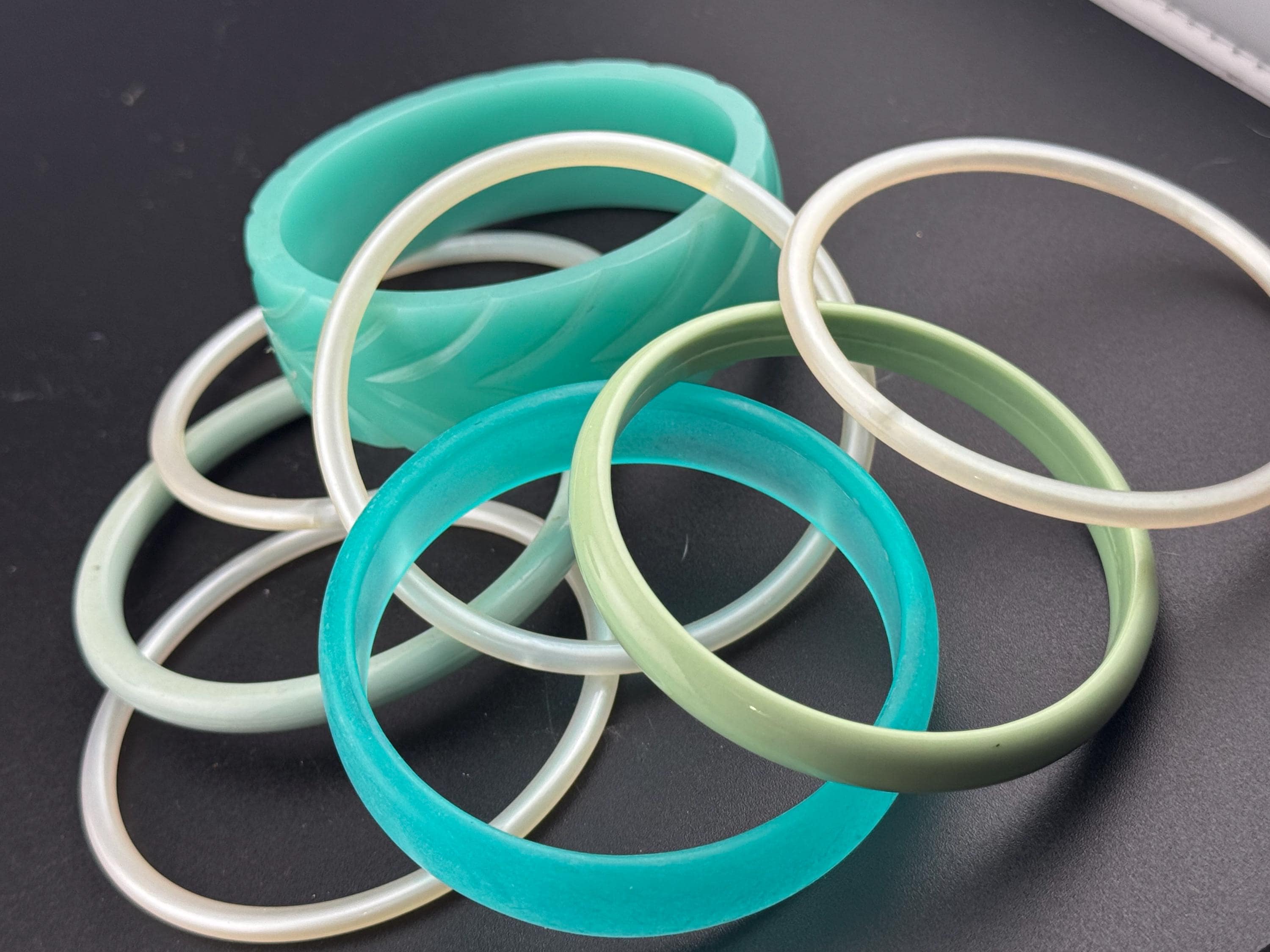 Vintage stack of light blue turquoise sage green tones chunky stylish plastic bangles retro acrylic bracelets