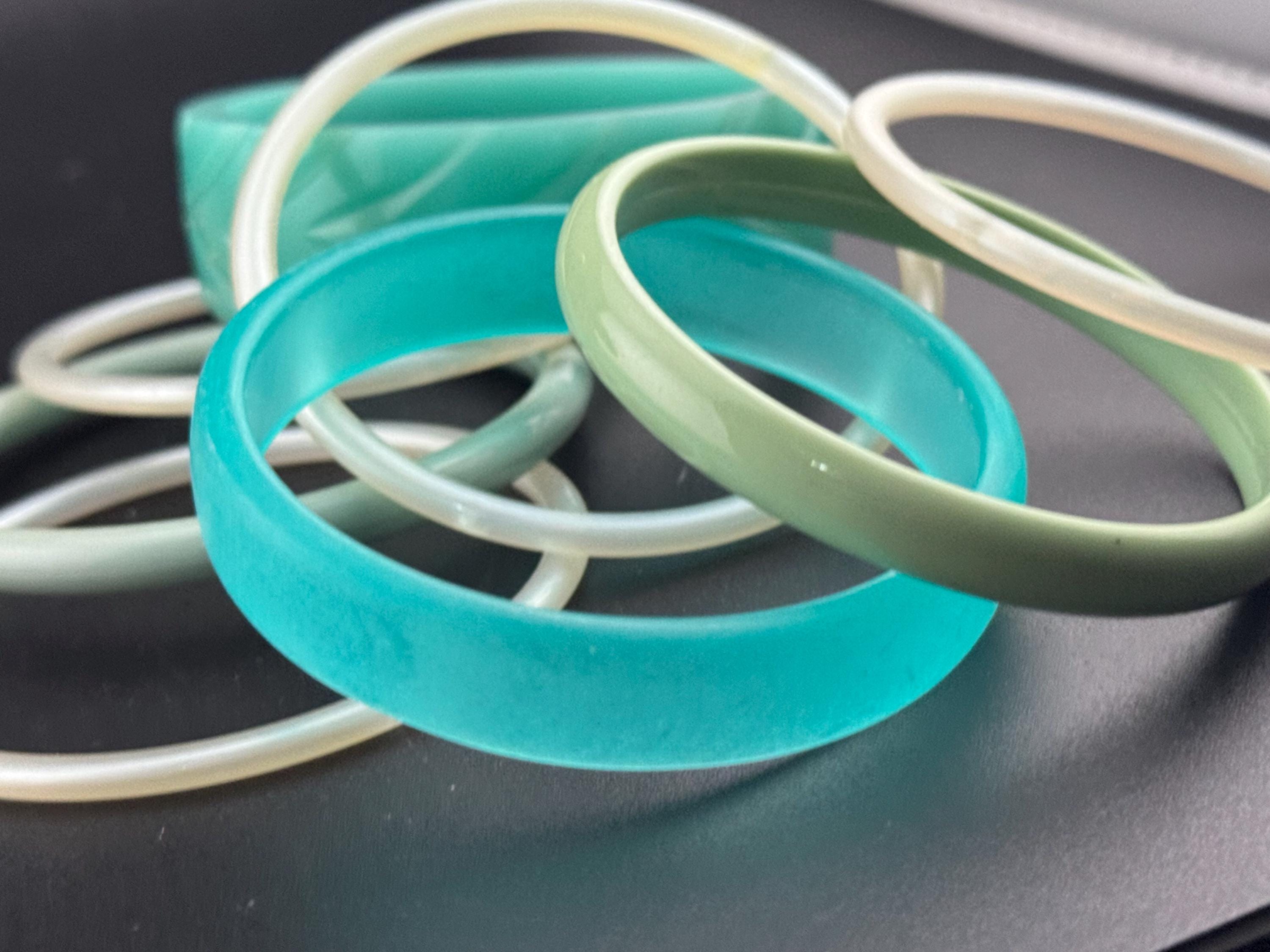 Vintage stack of light blue turquoise sage green tones chunky stylish plastic bangles retro acrylic bracelets