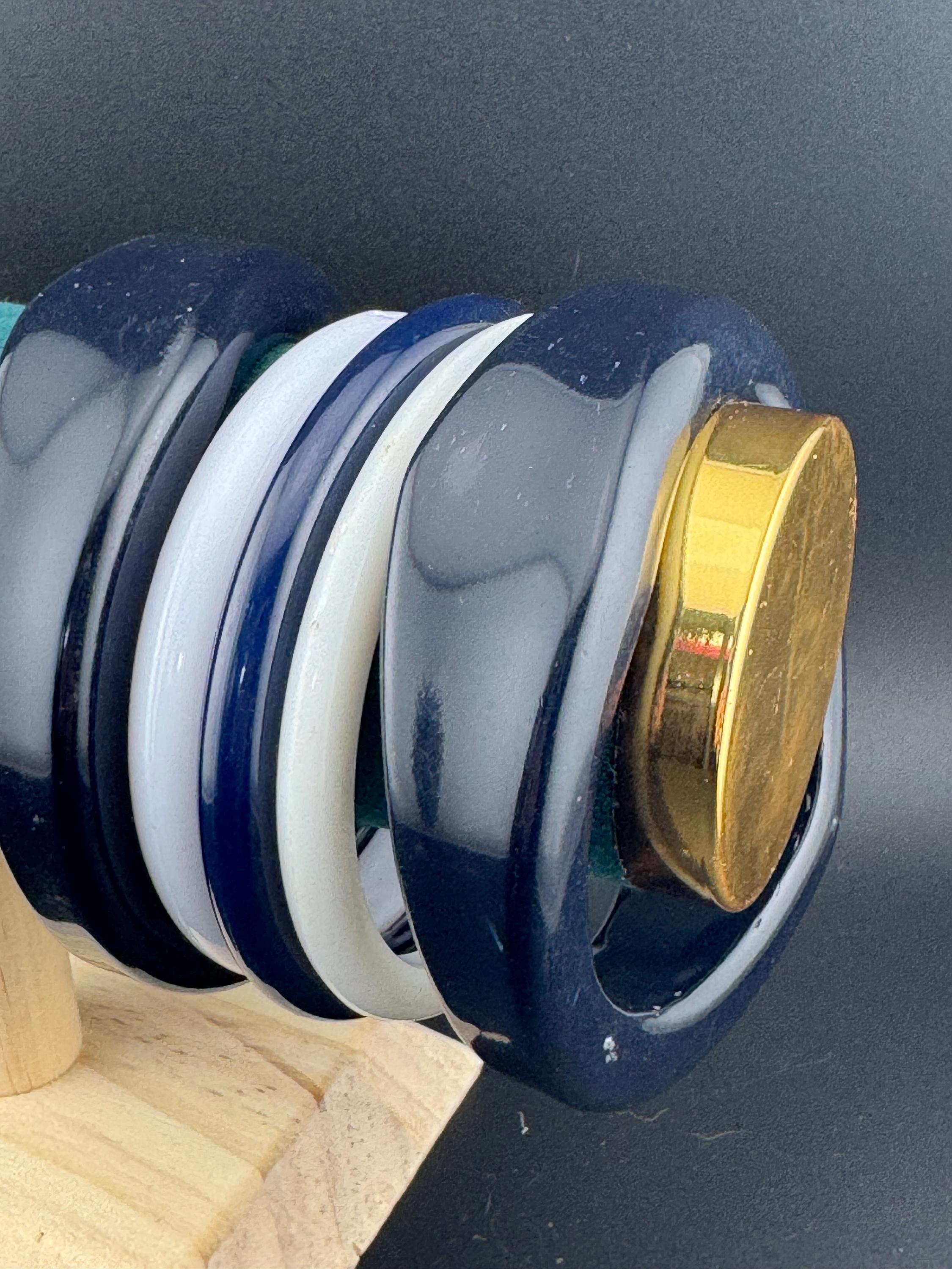 Vintage stack of dark navy blue and off white irregular Chunky stylish plastic bangles retro acrylic bracelets