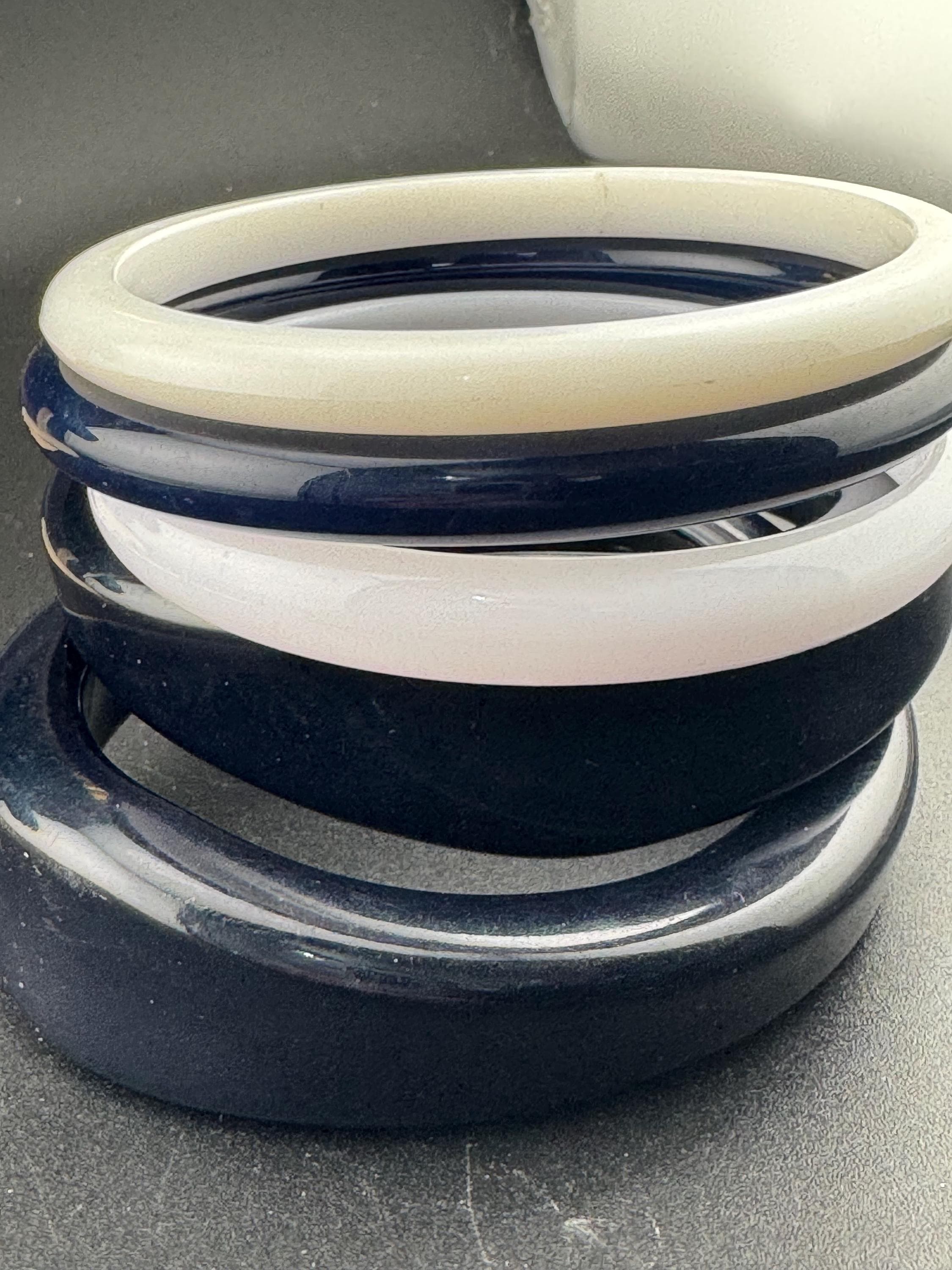 Vintage stack of dark navy blue and off white irregular Chunky stylish plastic bangles retro acrylic bracelets