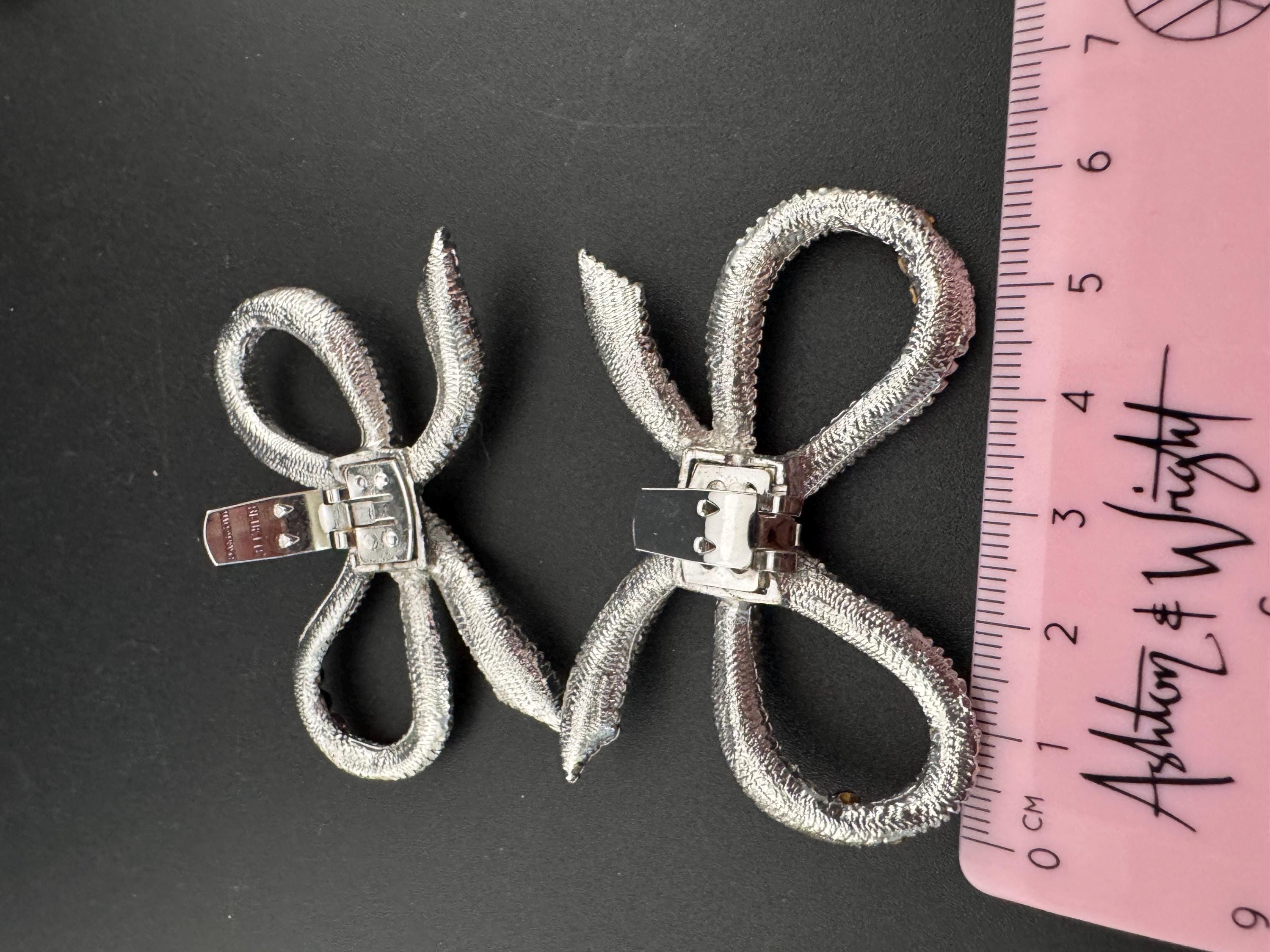 vintage Swarovski rhinestone pair of silver tone bow shoe or dress clip amethyst purple Glass diamanté paste 6cm wide
