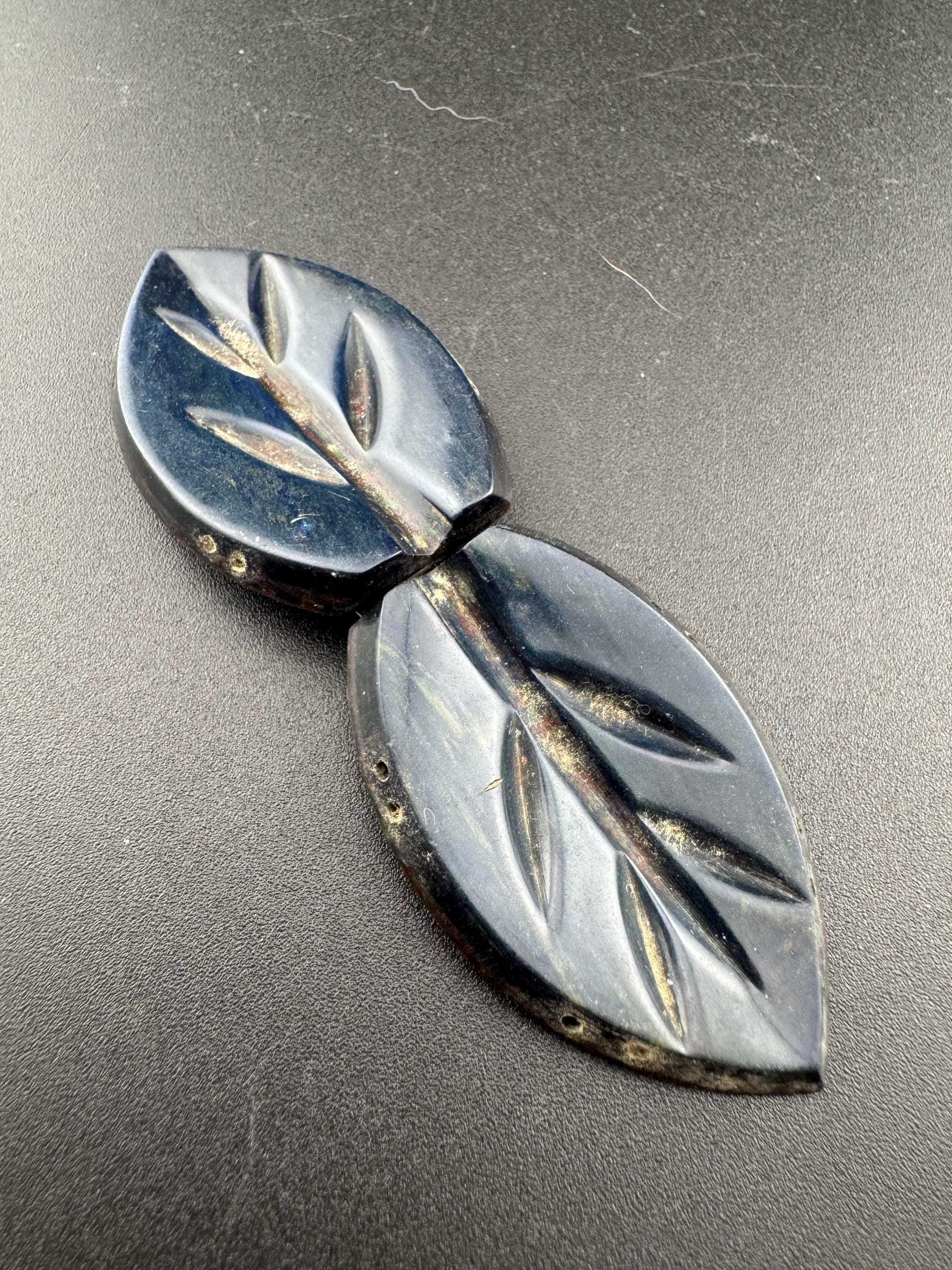 True Art Deco 2 part dark navy blue early plastic leaf belt buckle