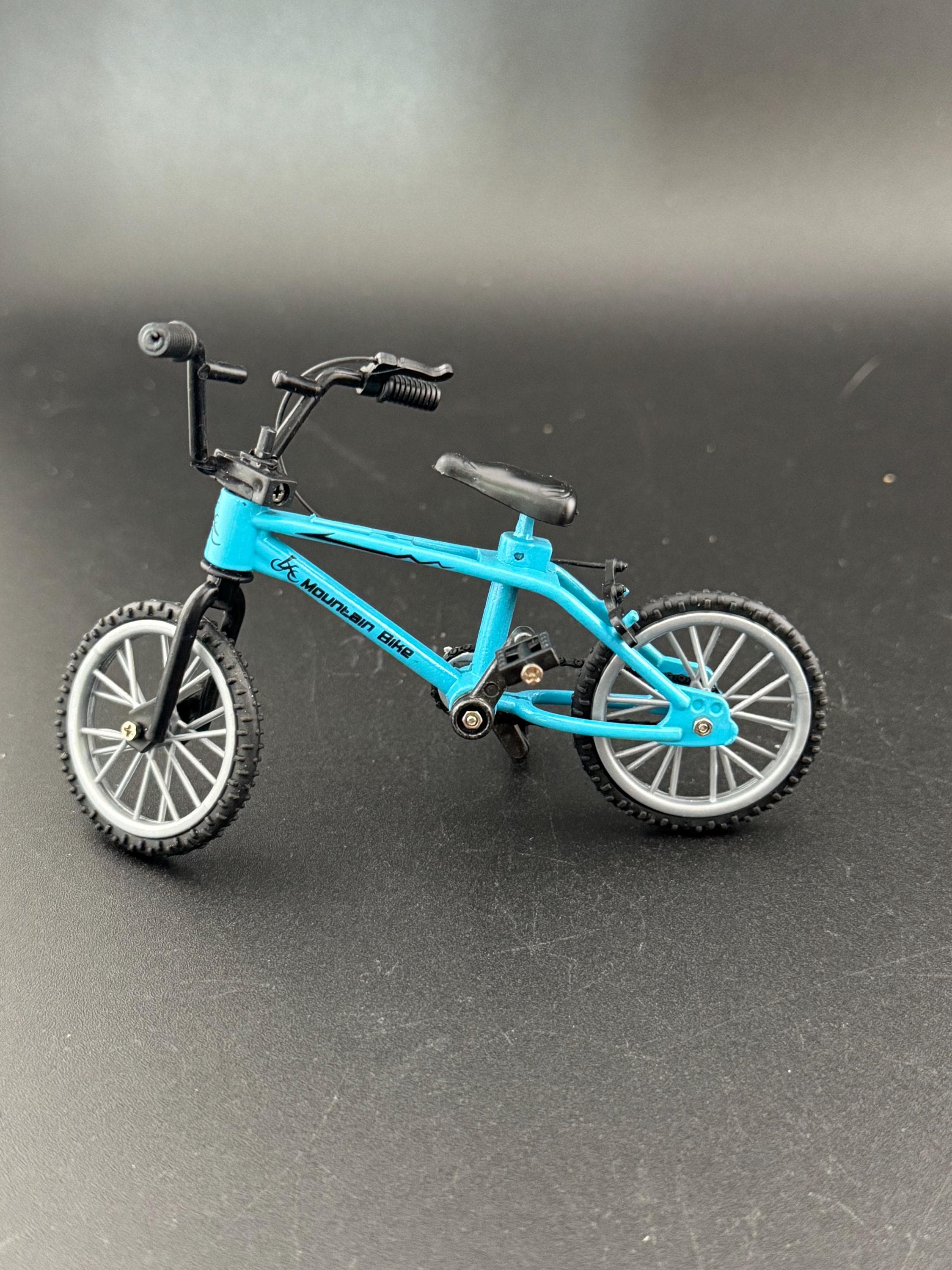 Miniature plastic BLUE mountain bike BMX cake topper decoration