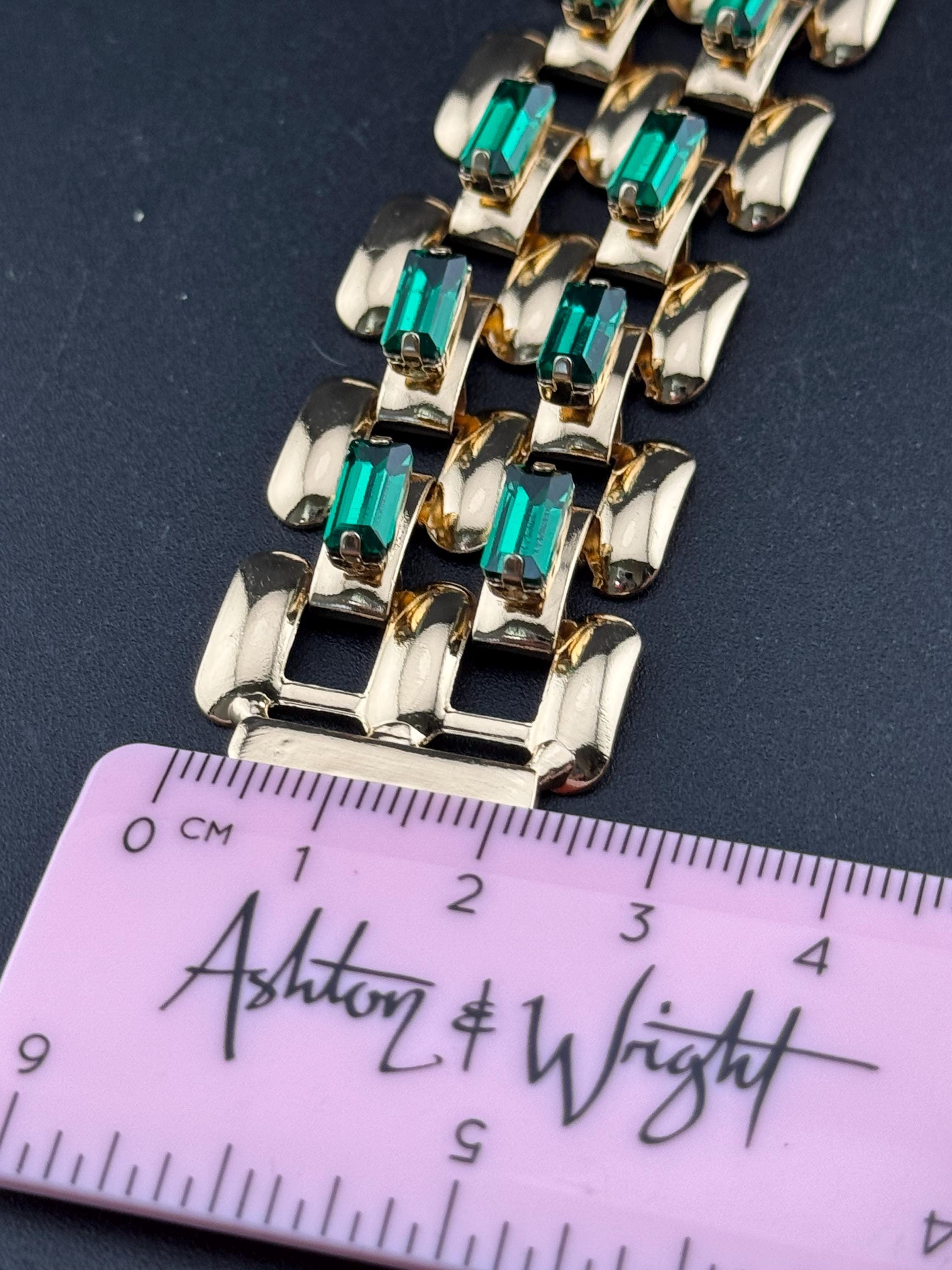 Wide lightweight aluminium Flat brick panther link gold tone bracelet with emerald baguette glass rhinestones