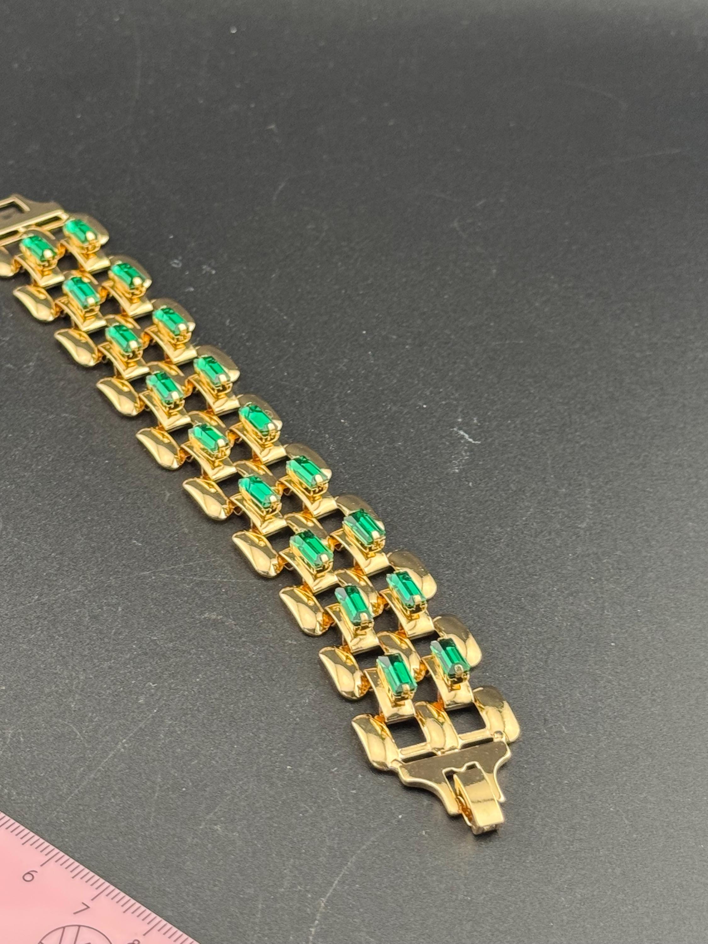 Wide lightweight aluminium Flat brick panther link gold tone bracelet with emerald baguette glass rhinestones