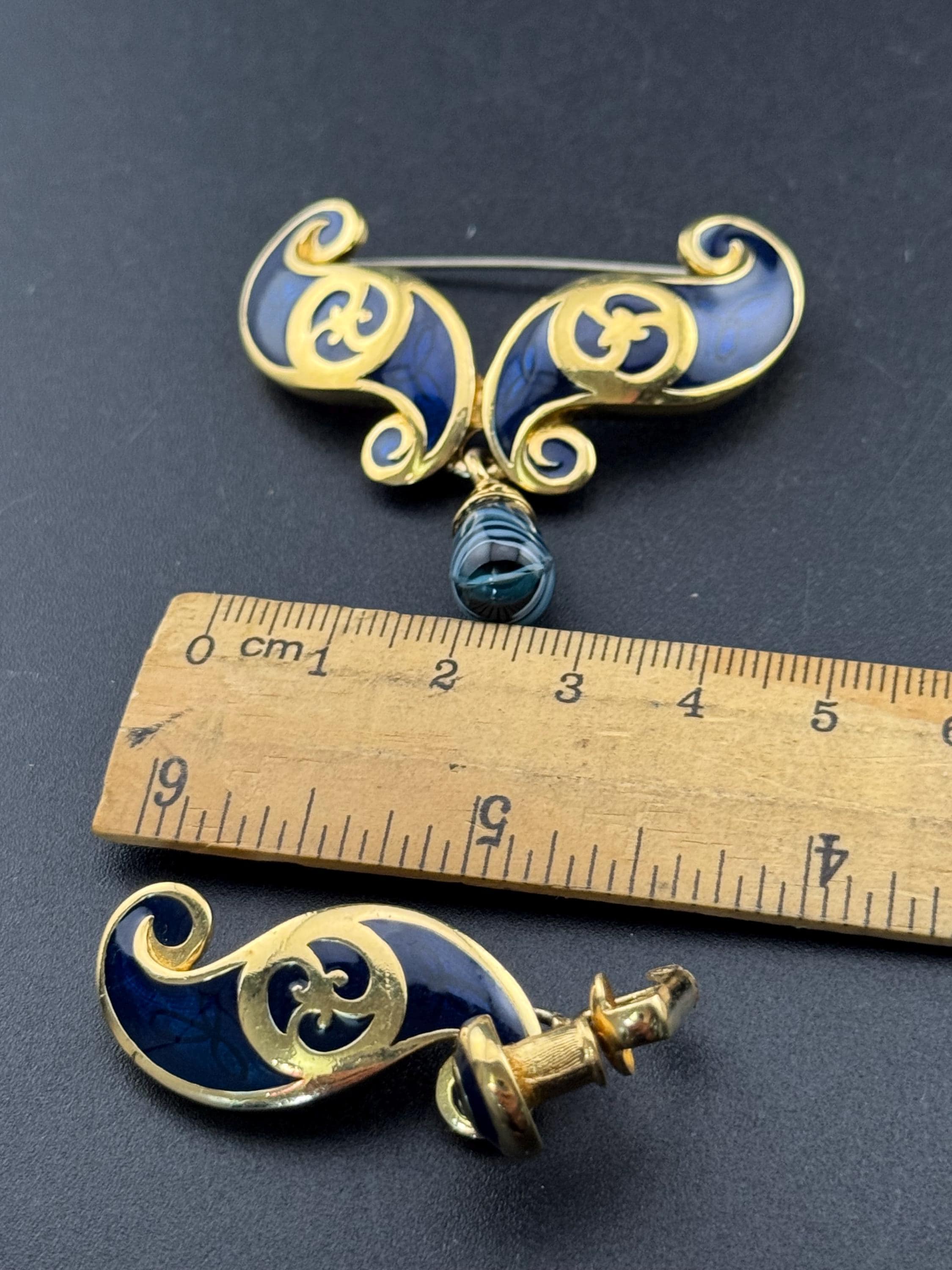 signed PT Etruscan style navy blue and gold drop brooch and matching clip on earrings, past times jewellery set 1980s