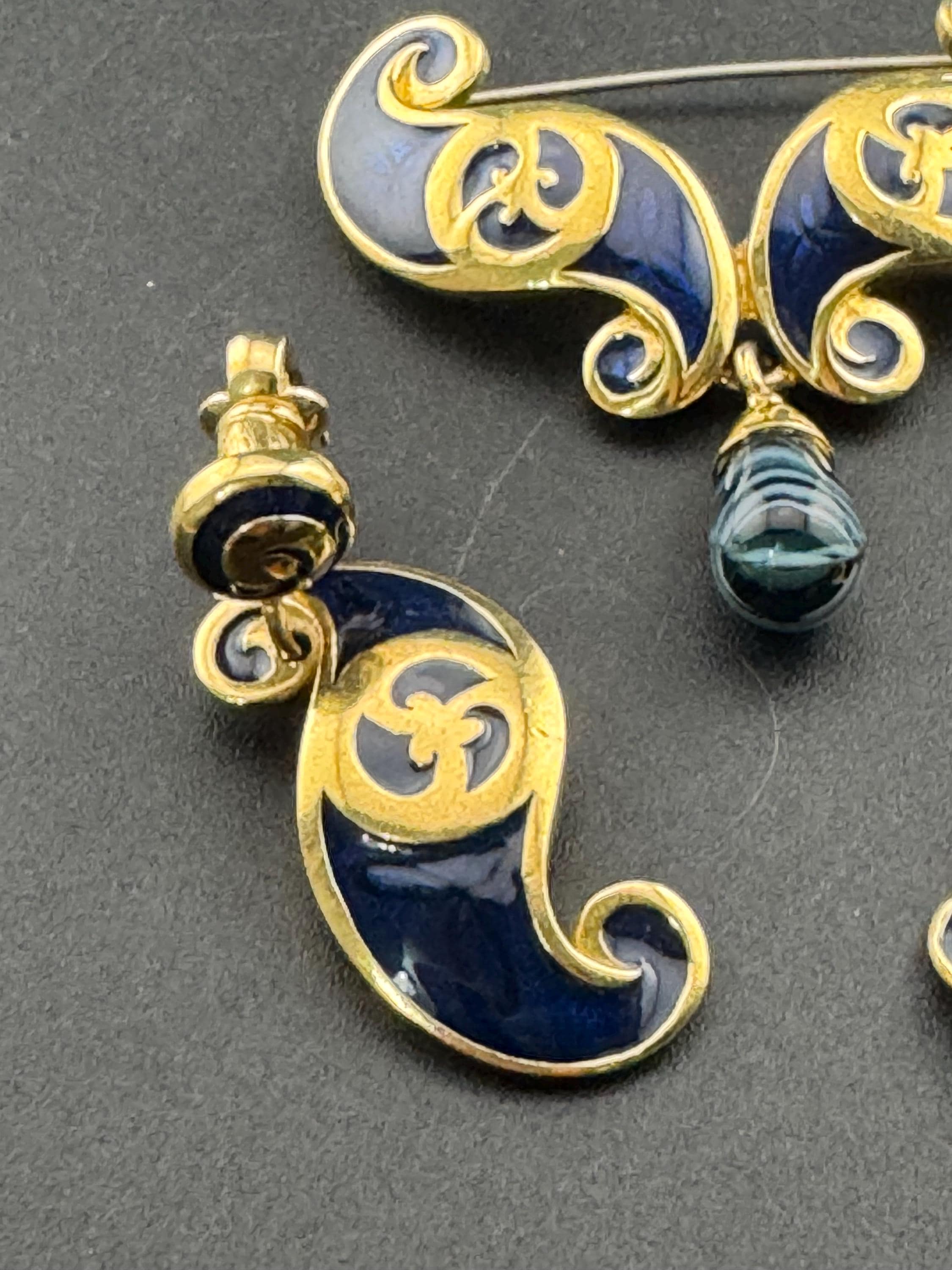 signed PT Etruscan style navy blue and gold drop brooch and matching clip on earrings, past times jewellery set 1980s