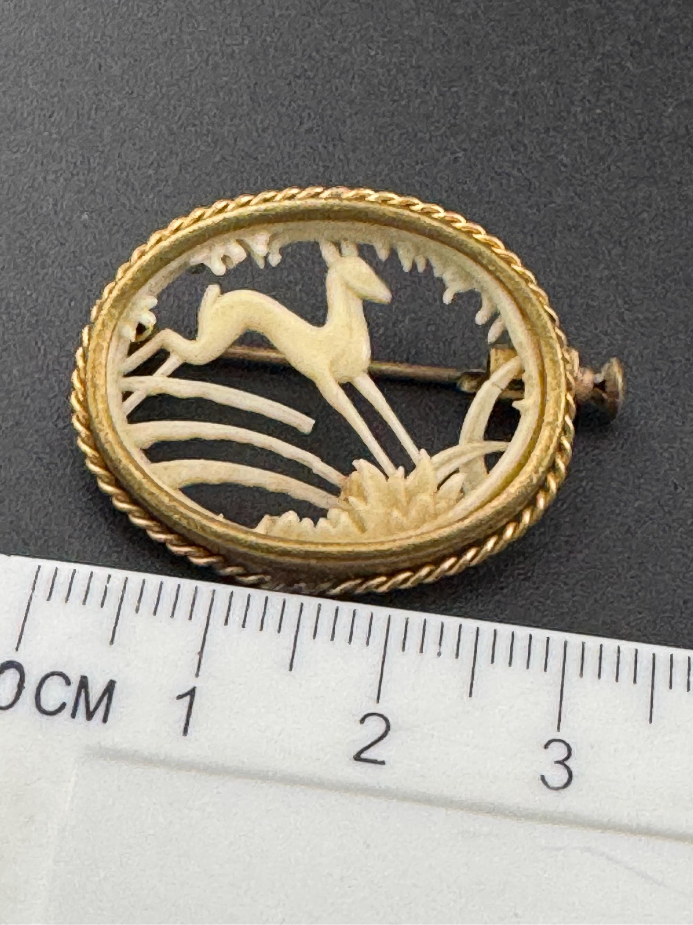 Vintage Art Deco French brass and cream early plastic celluloid woodland stag scene cut out work brooch 1930s 1920s