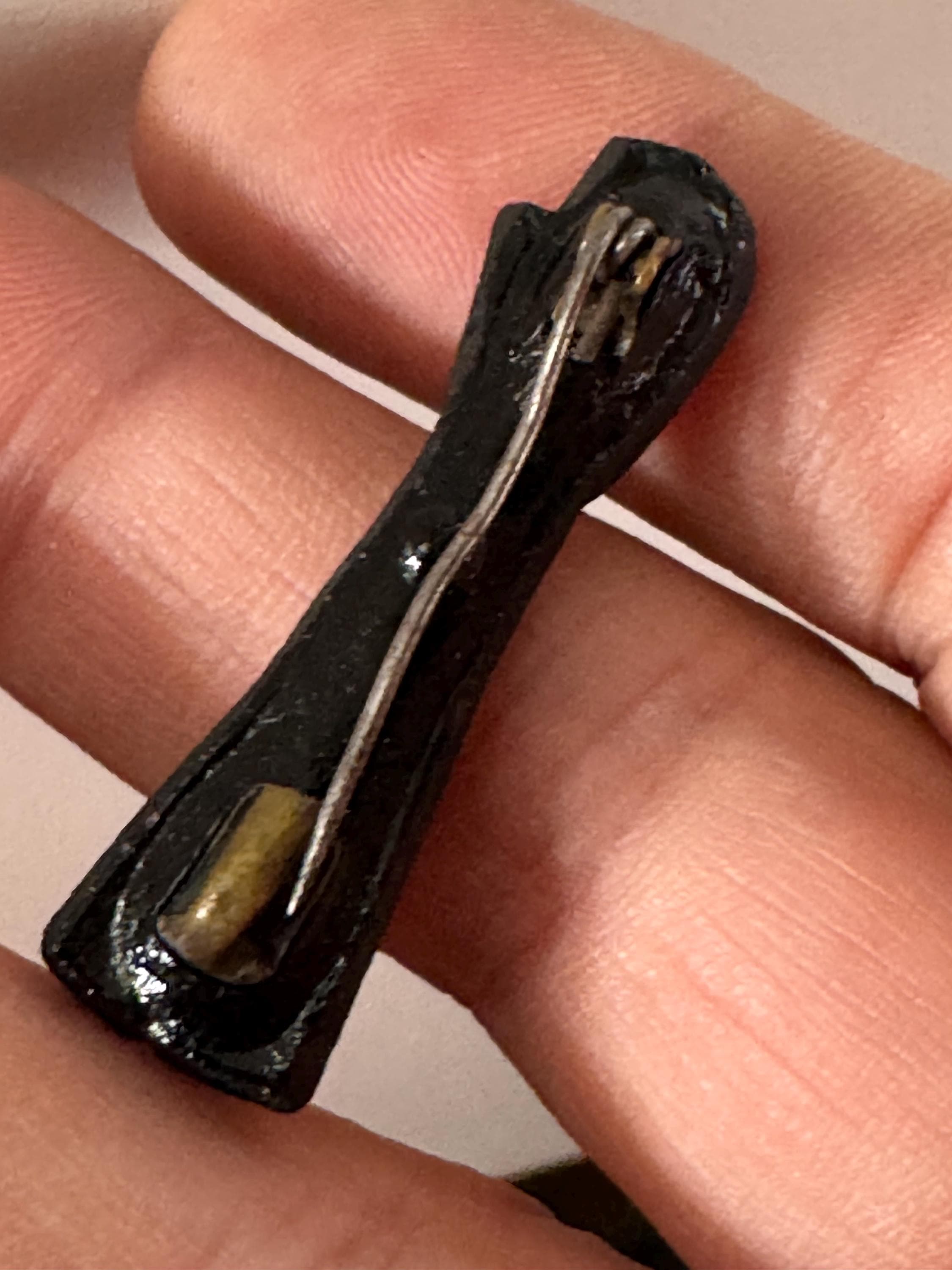 antique Czech figa hand brooch in black moulded glass